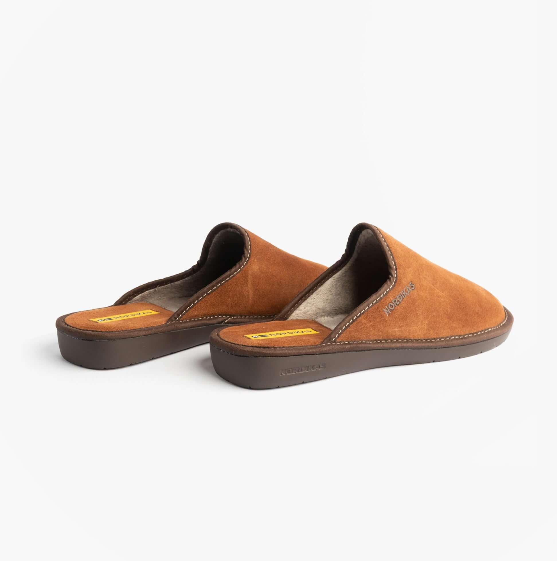 Nordikas 131 Mens Suede Mule Slippers Brown side view showing comfortable slip-on design and suede material.