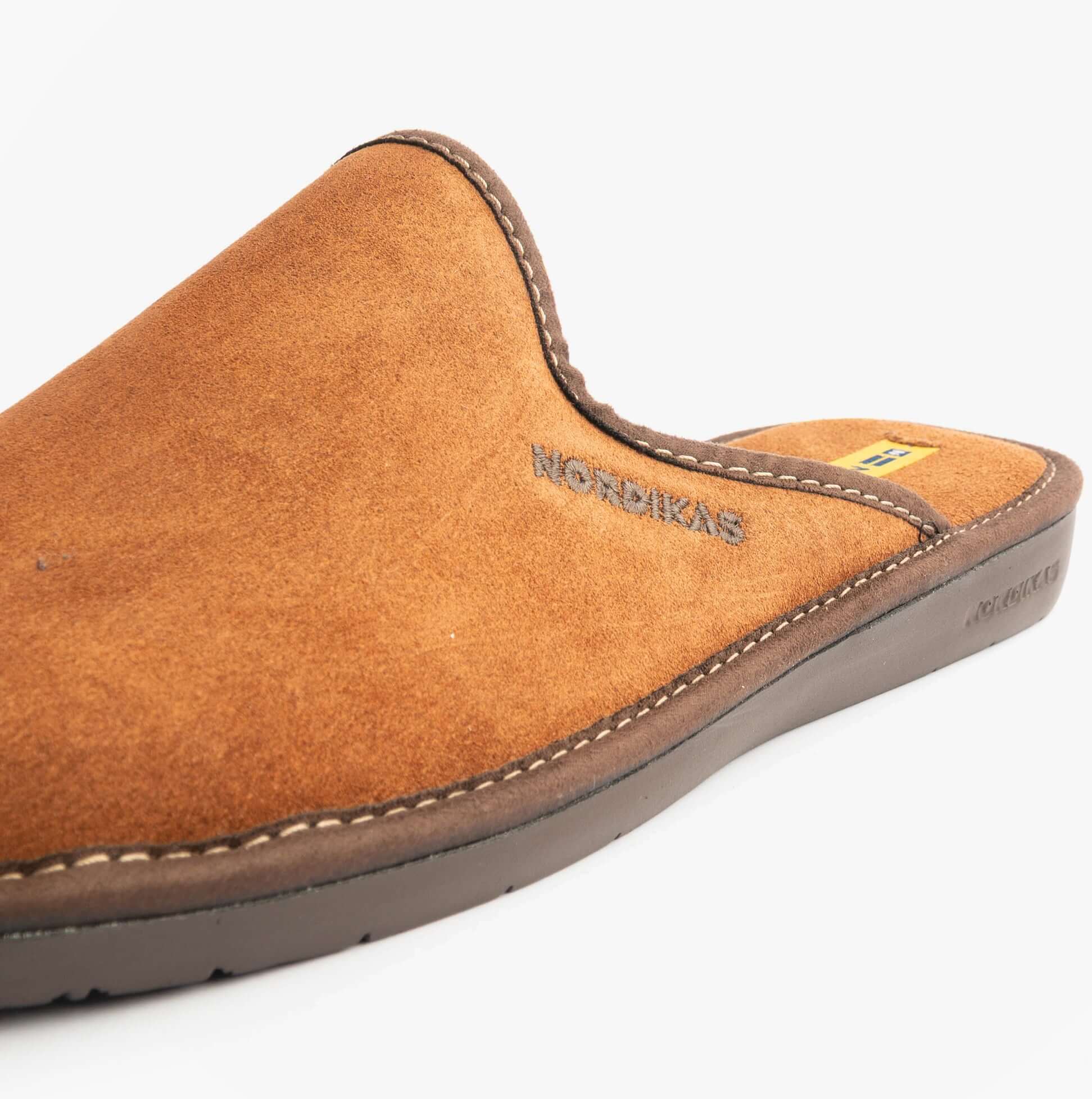 Nordikas 131 Mens Suede Mule Slippers Brown detail view of brown suede upper with stitching and logo