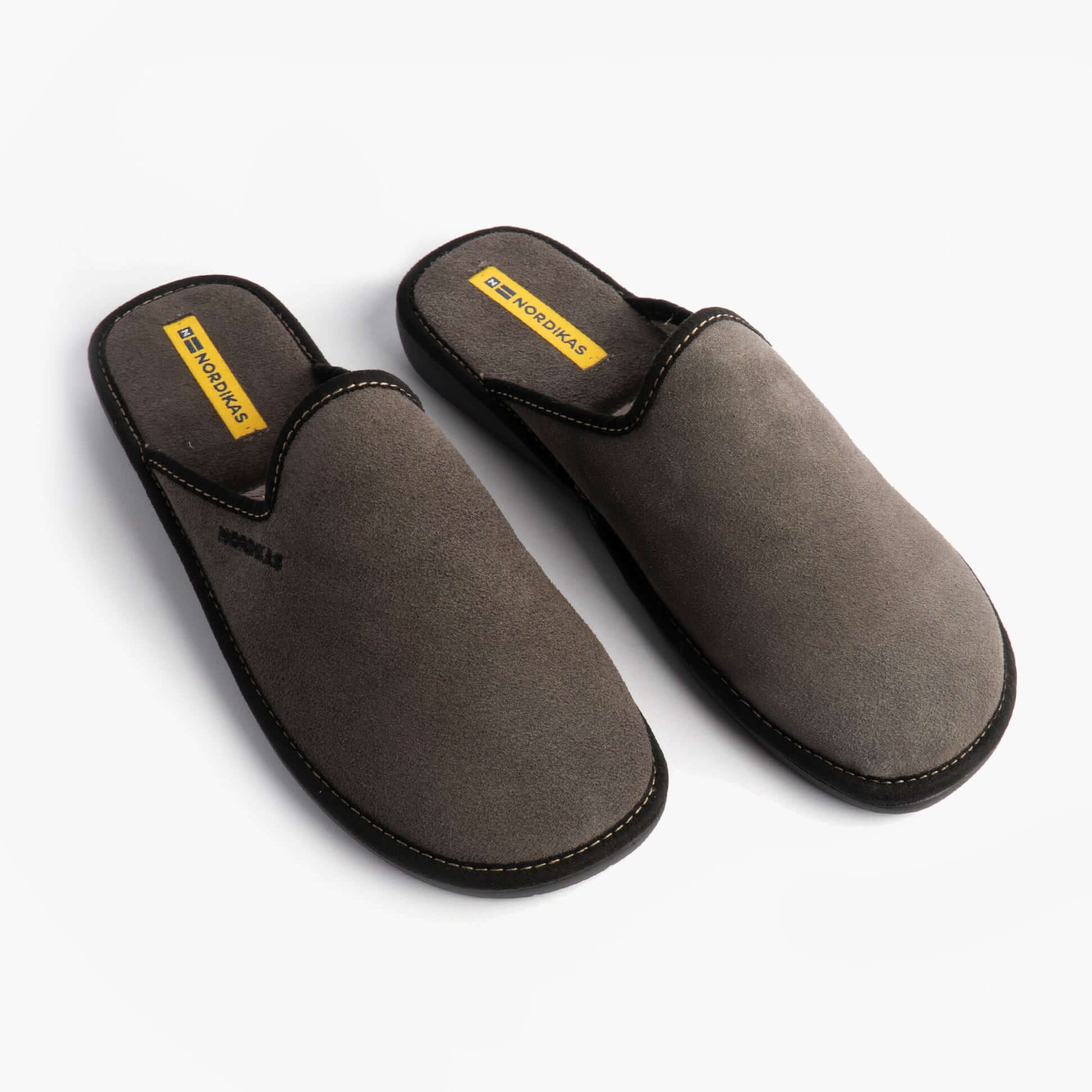 Nordikas 131 Mens Suede Mule Slippers Grey side view showcasing the comfortable suede upper and slip-on design.