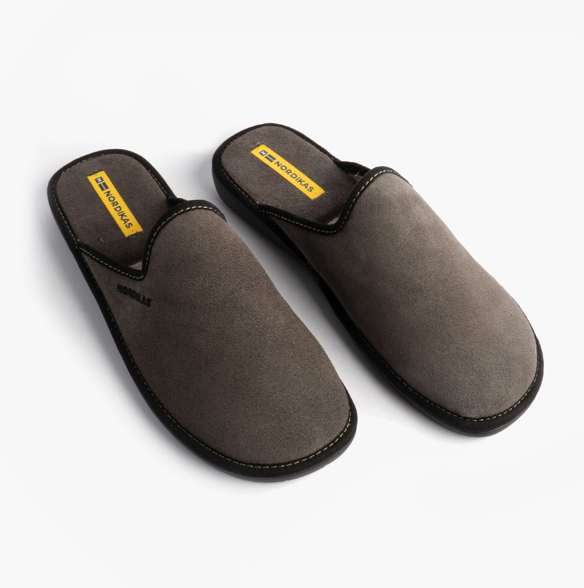 Nordikas 131 Mens Suede Mule Slippers Grey side view showcasing the comfortable suede upper and slip-on design.