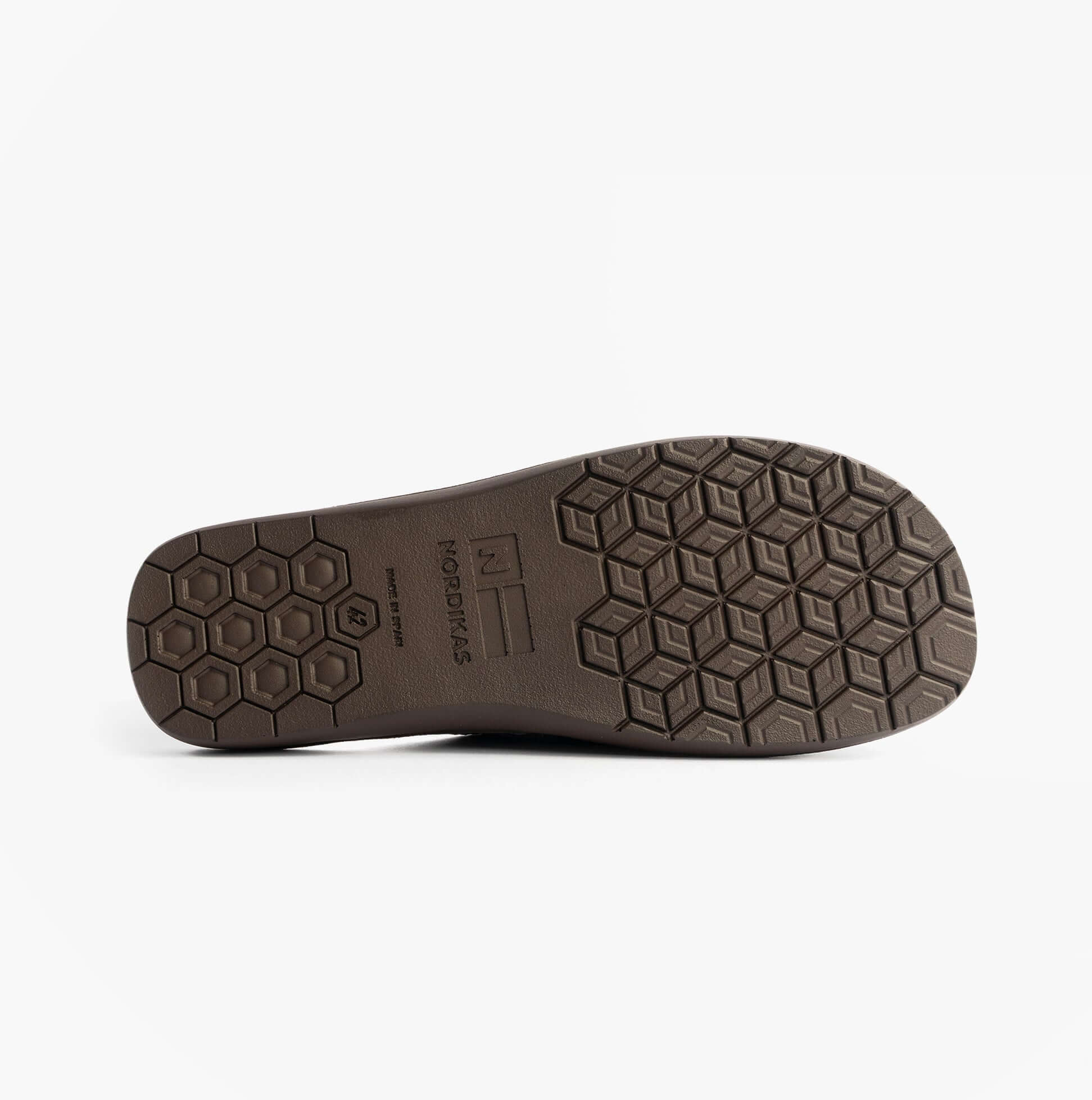 Nordikas 131 Mens Suede Mule Slippers Marine Blue bottom view showing rubber sole with unique hexagon pattern.