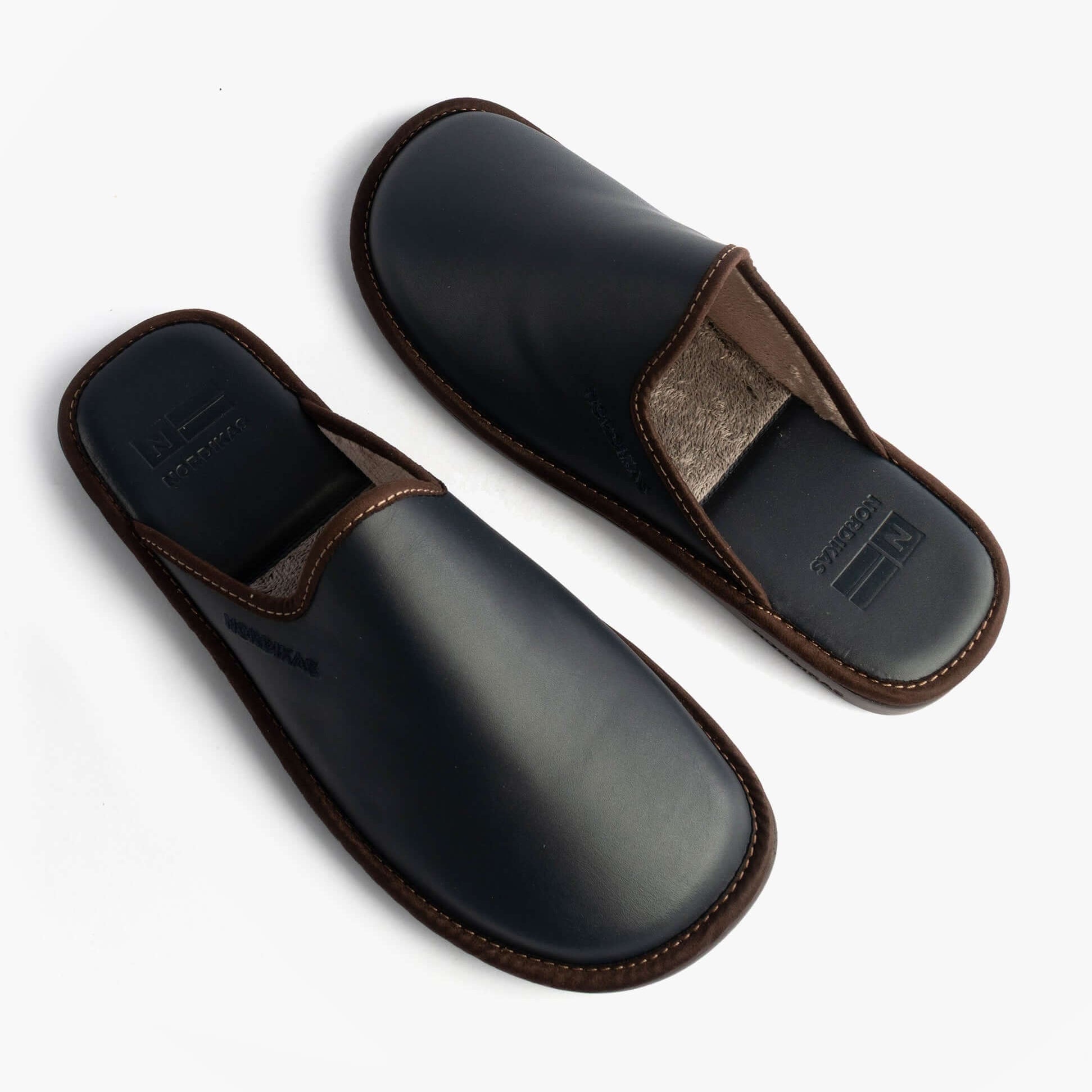 Nordikas 131 Mens Leather Mule Slippers Navy top view showing leather material and slip-on design.