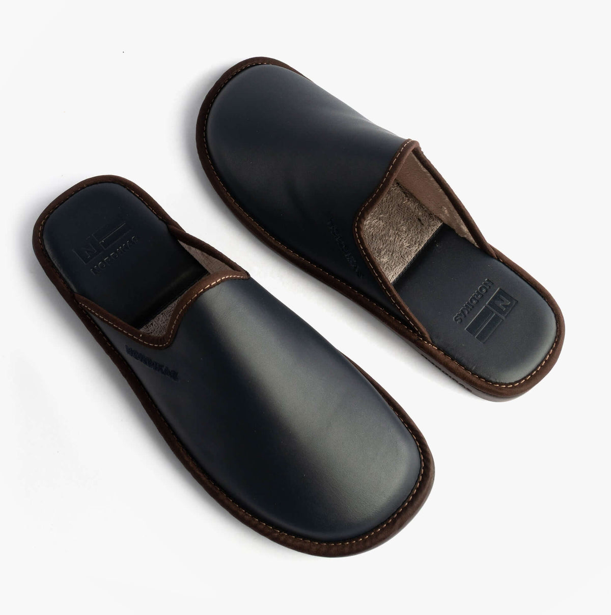 Nordikas 131 Mens Leather Mule Slippers Navy top view showing leather material and slip-on design.