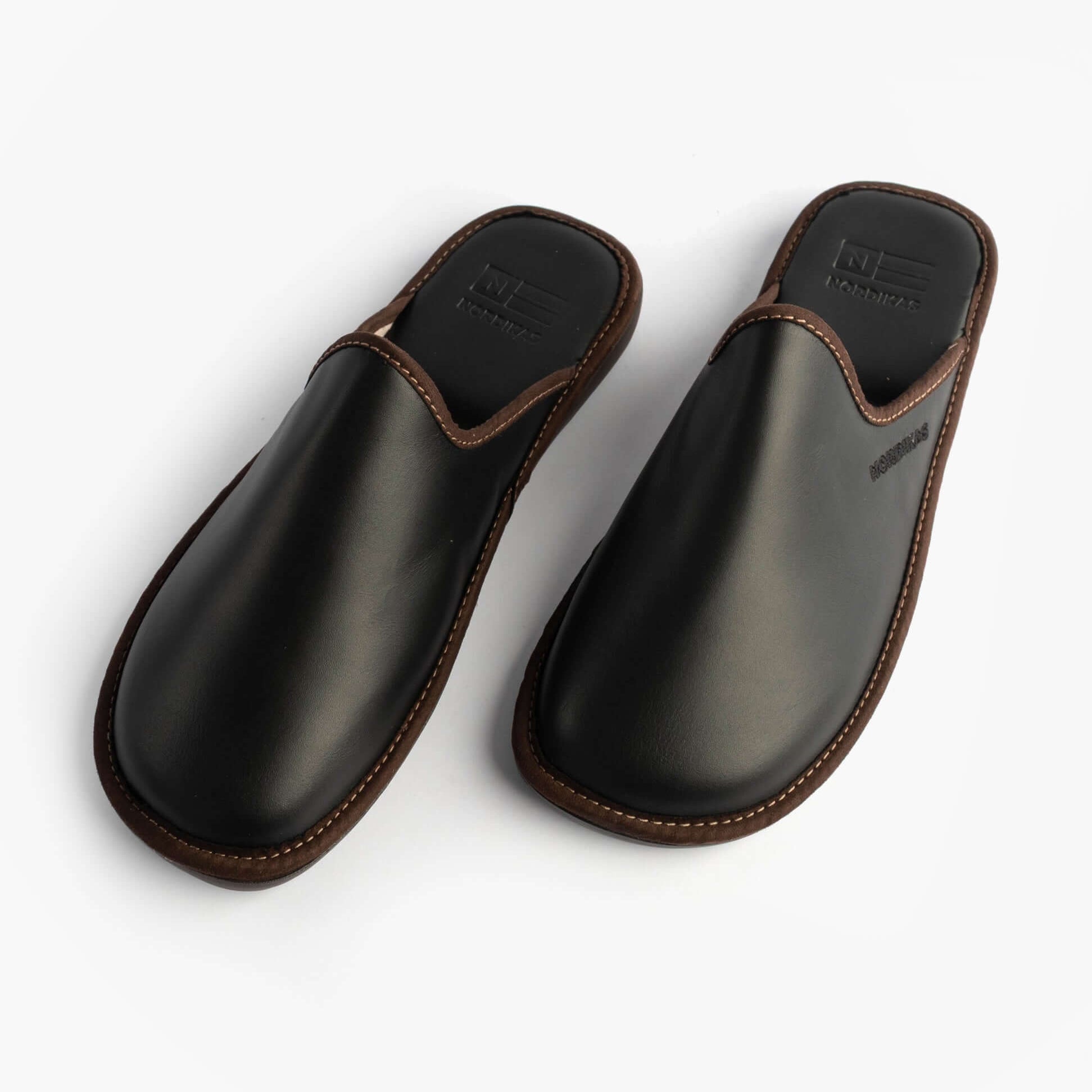 Nordikas 131 Mens Leather Mule Slippers Black, top view showcasing premium leather and slip-on design.