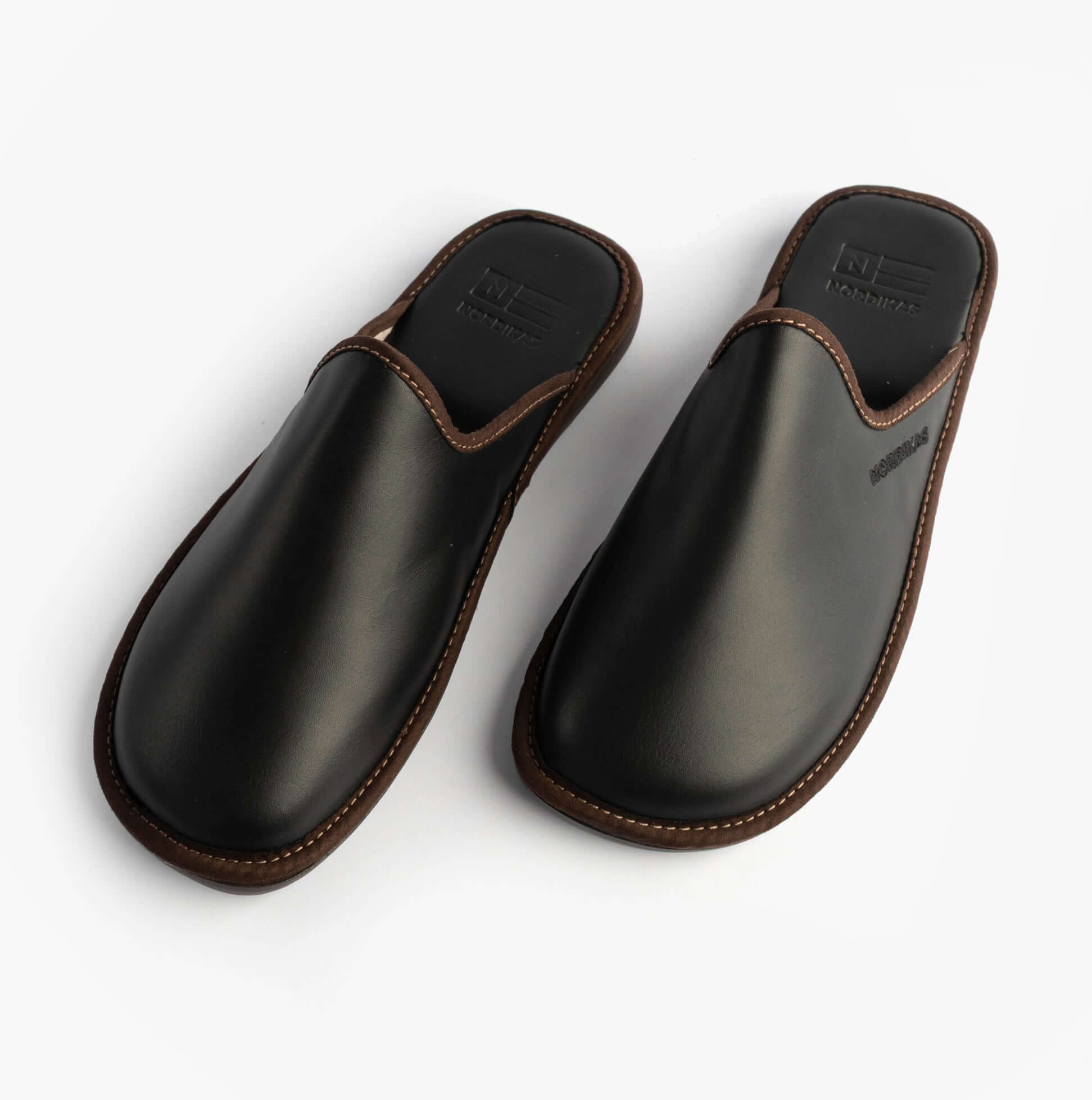 Nordikas 131 Mens Leather Mule Slippers Black, top view showcasing premium leather and slip-on design.