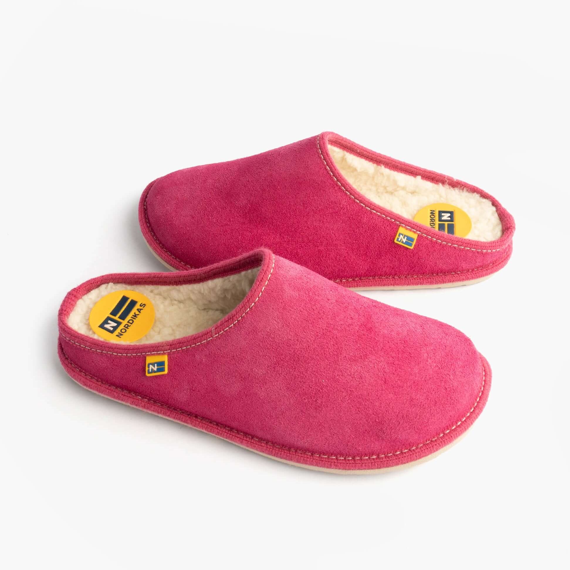 Nordikas 2083 Womens Fur Lined Mule Slippers Pink side view featuring suede upper and textile lining.