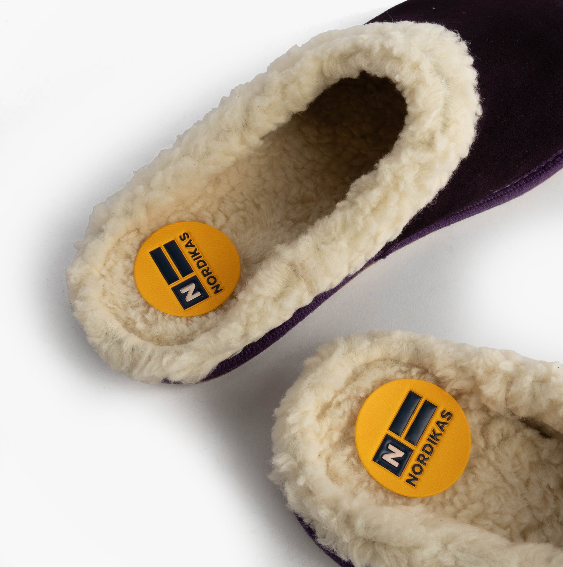 Nordikas 2087 Womens Suede Mule Slippers Purple top view showing faux fur lining and brand tag.