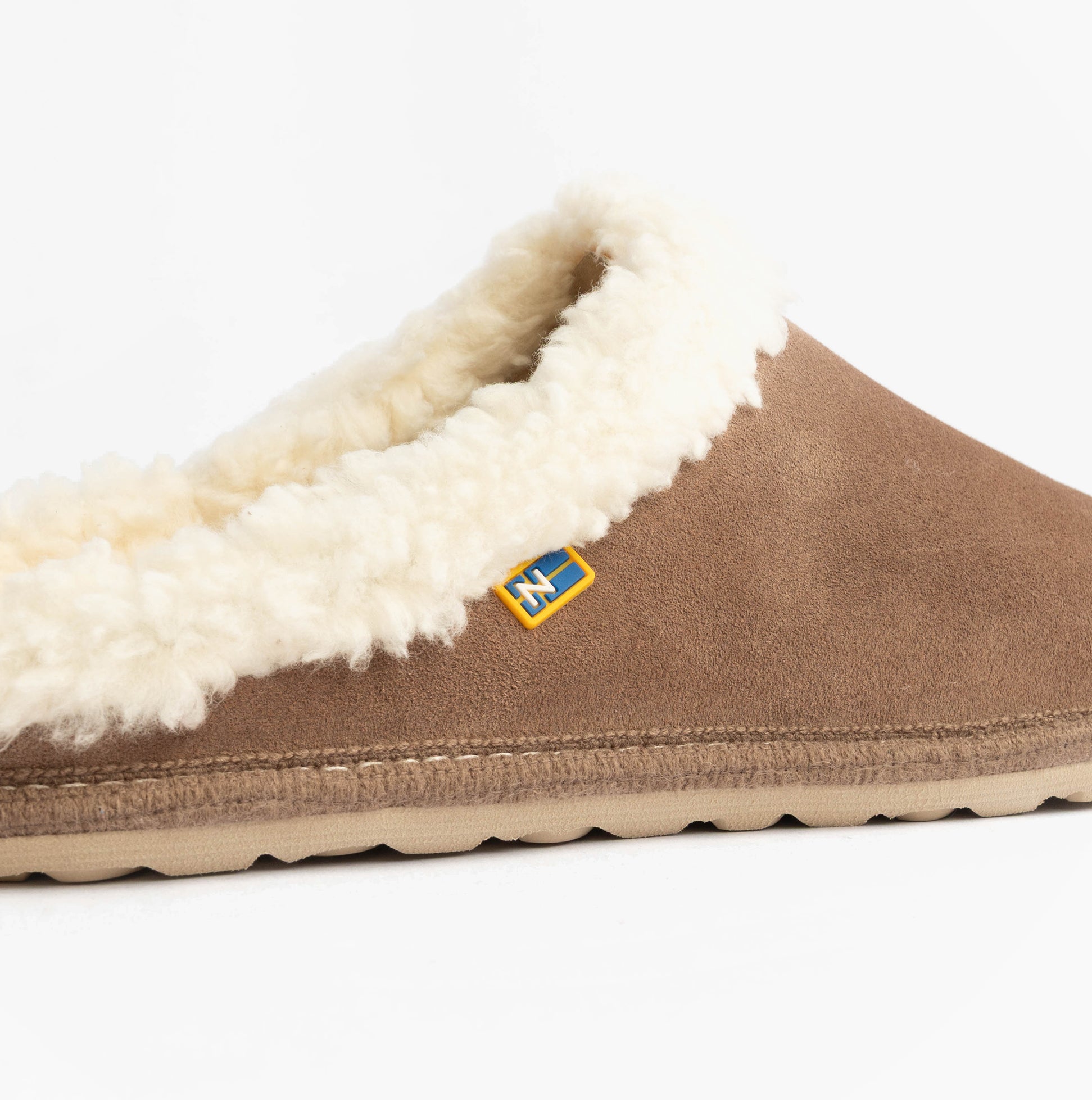 Nordikas 2087 Womens Suede Mule Slippers Piedra side view with faux fur lining in beige color.