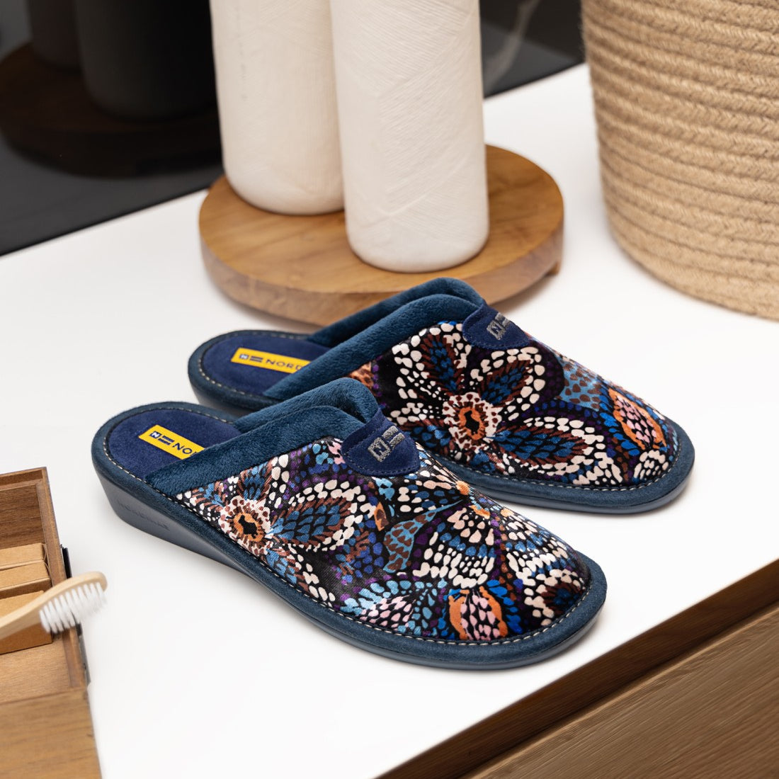 Nordikas 2155 Womens Mule Slippers Multi side view showcasing colorful floral design on textile upper and comfortable slip-on style.