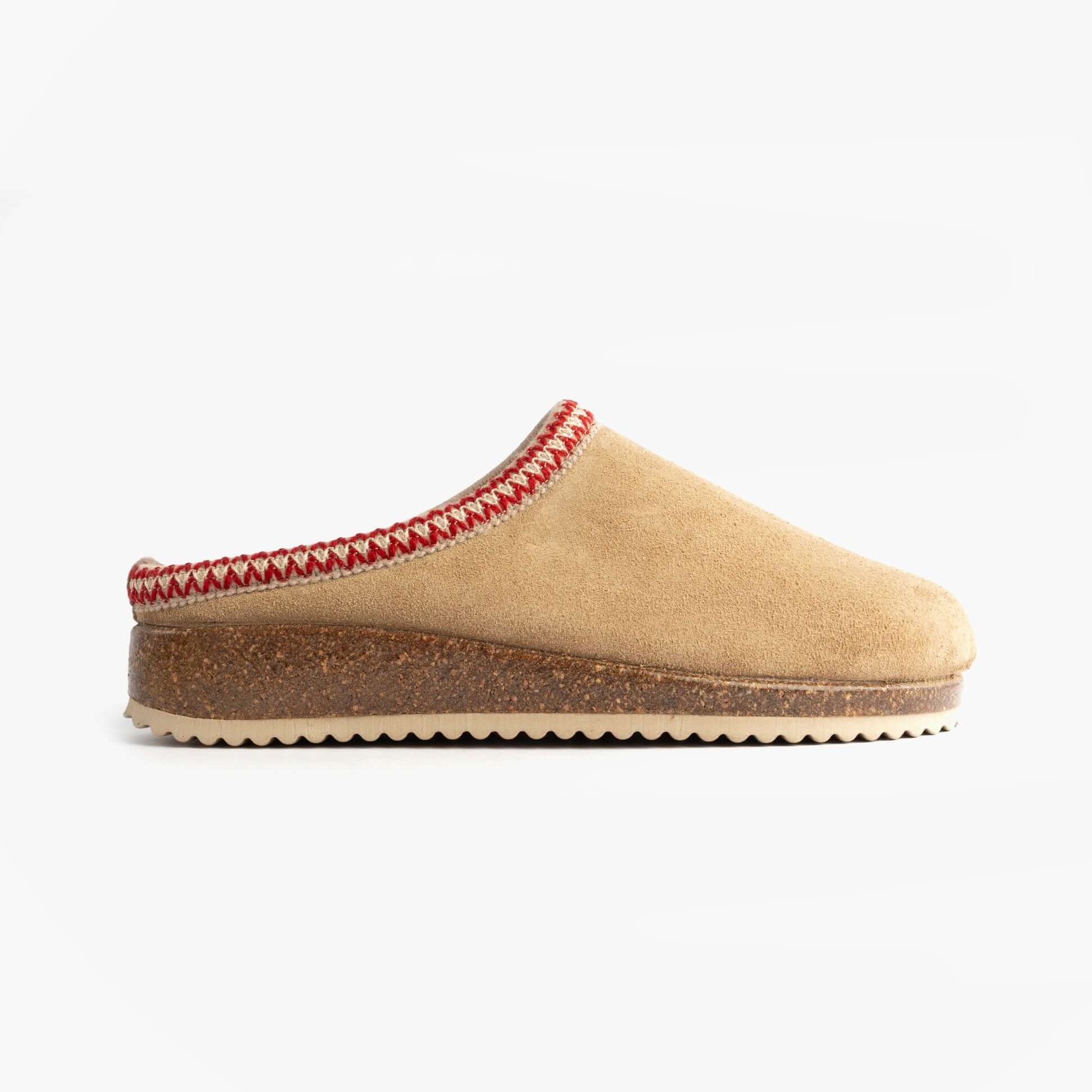 Nordikas 2247 Womens Suede Mule Slippers Beige side view showcasing the suede upper and decorative edge detail.