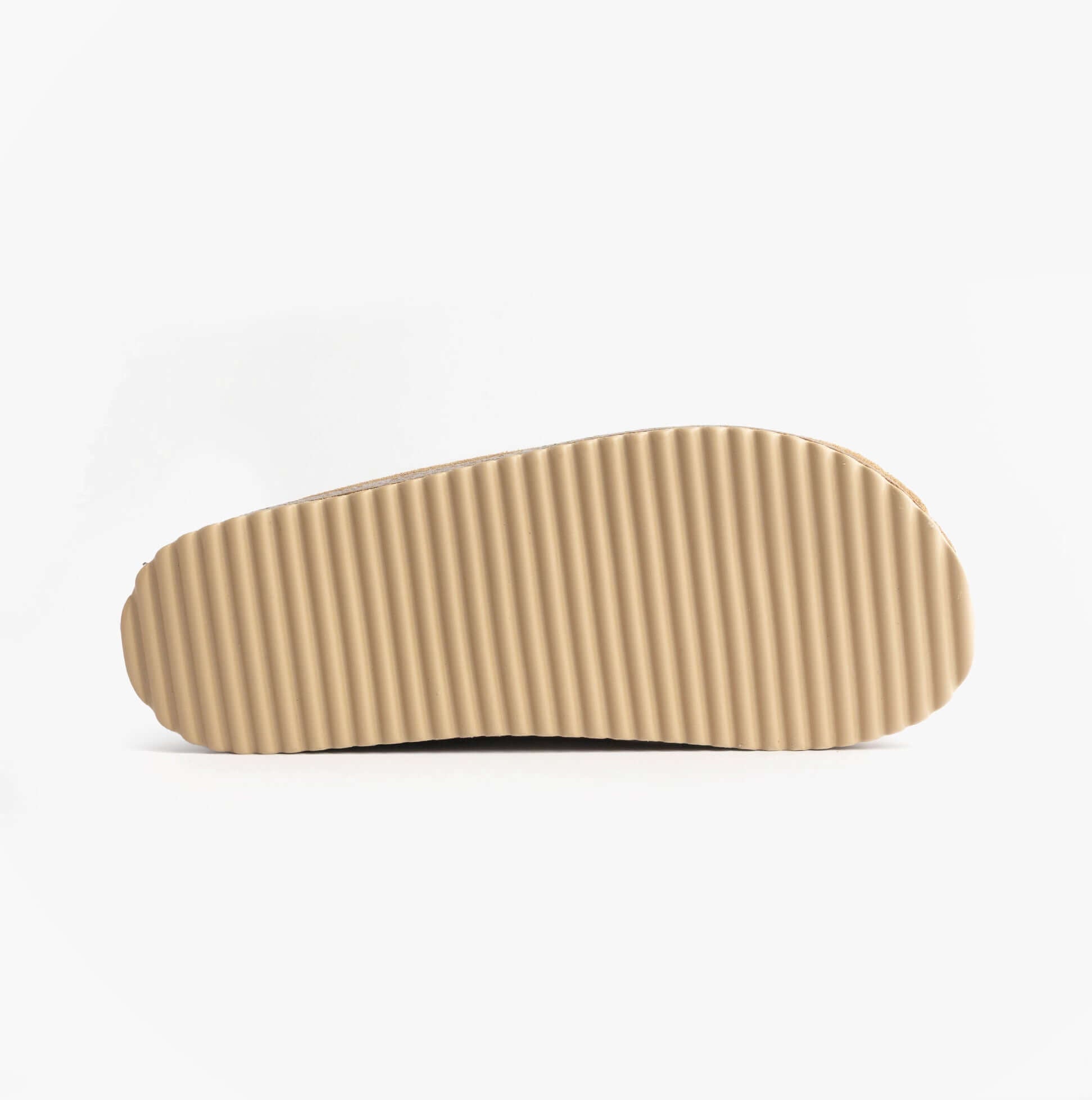 Nordikas 2247 Womens Suede Mule Slippers Beige sole view, showcasing rubber sole with ribbed texture for grip.
