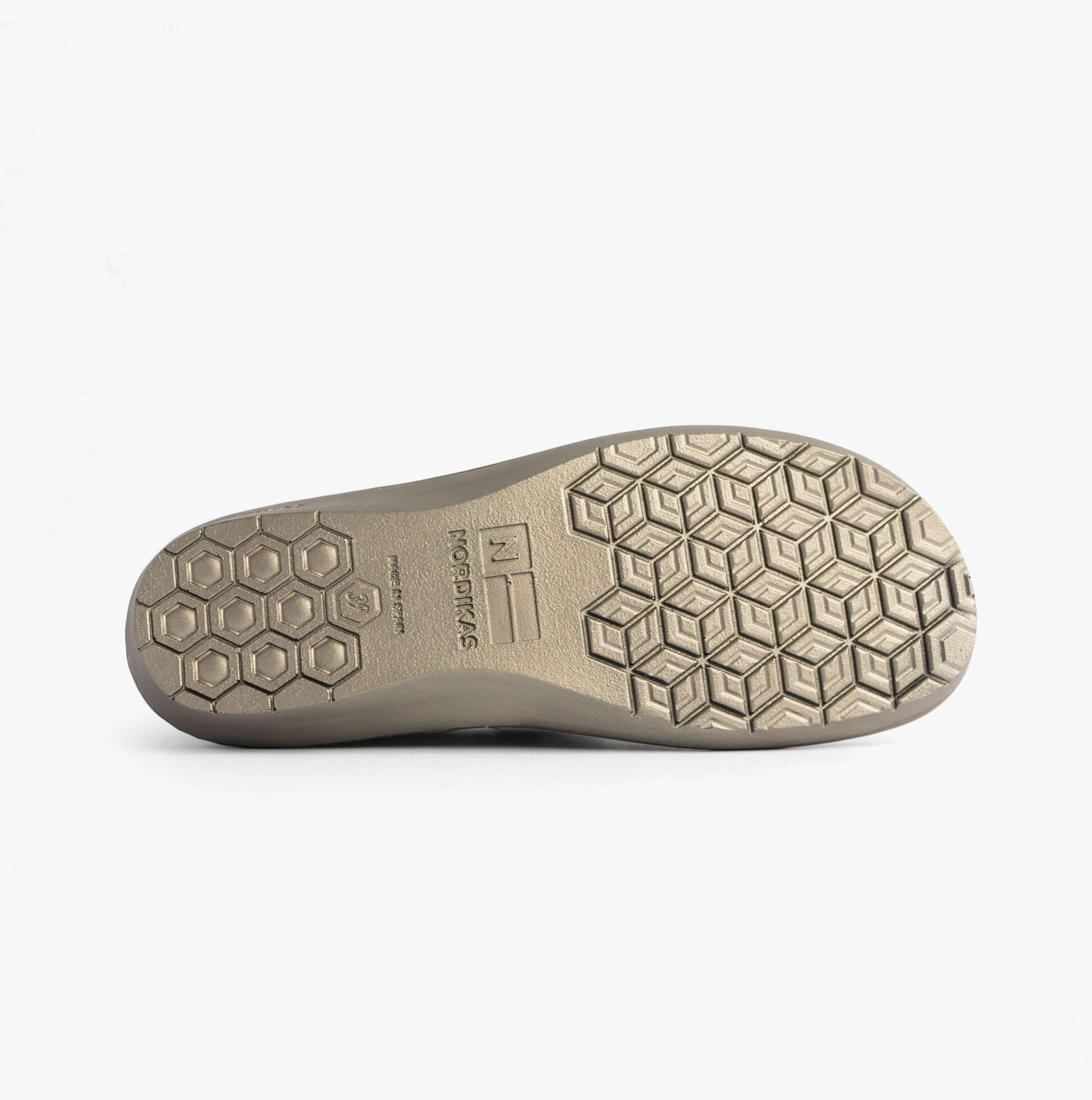 Nordikas 305 Womens Leather Full Slippers Marine Blue sole view with rubber material and textured hexagonal pattern.