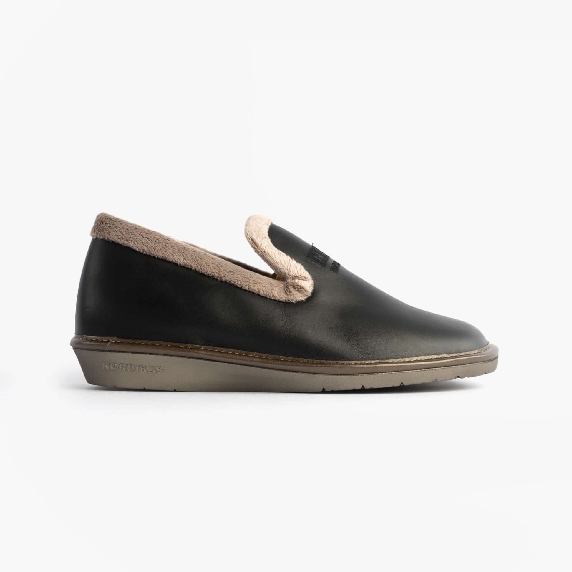 Nordikas 305 Womens Leather Full Slippers Black side view showcasing the sleek black leather and plush lining.