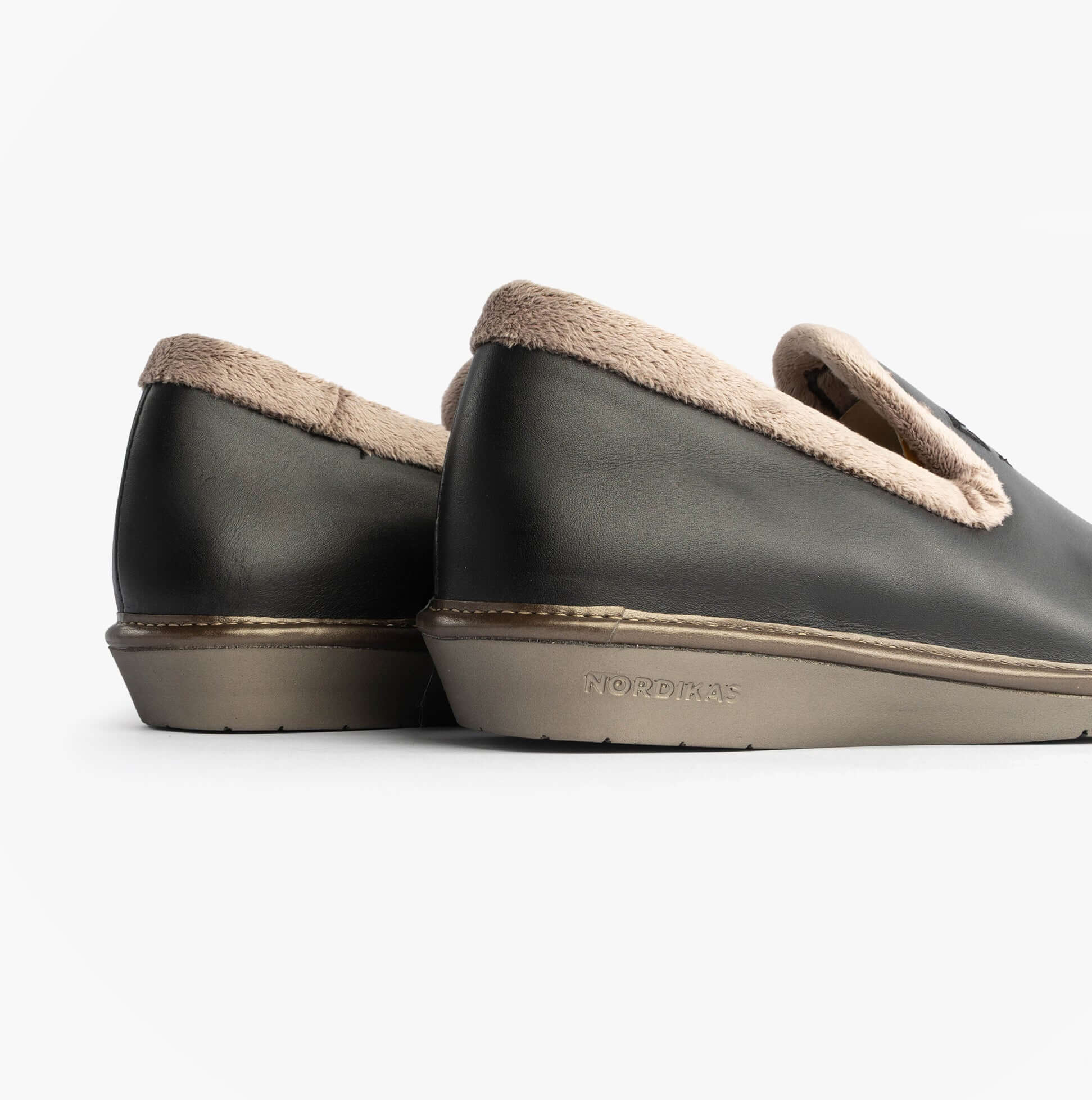 Nordikas 305 Womens Leather Full Slippers Black rear view showcasing soft lining and rubber sole.