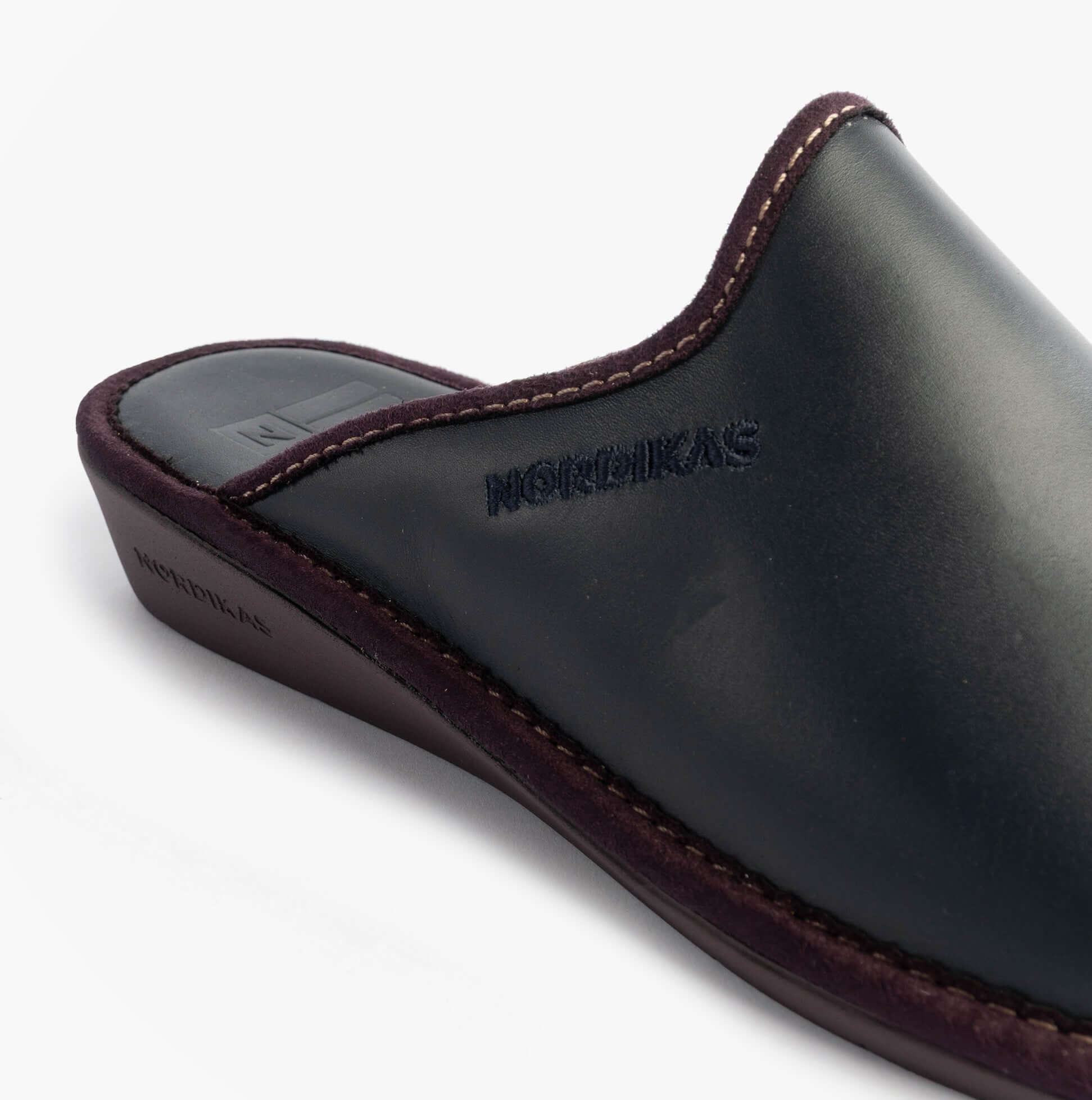 Nordikas 347 Womens Leather Mule Slippers Marine Blue side view showcasing premium leather and comfortable slip-on design.