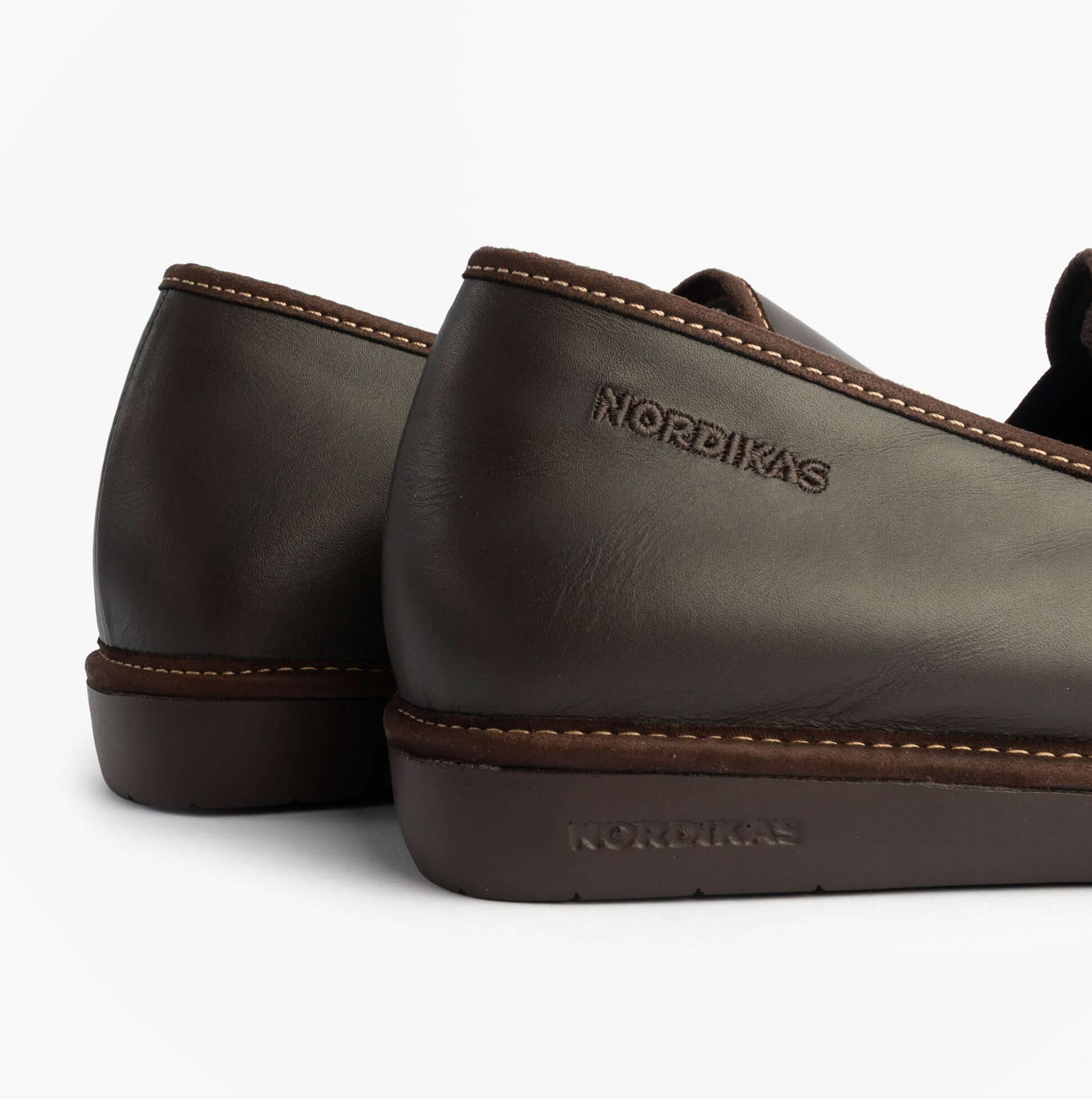 Nordikas 663 Mens Leather Full Slippers Mocha side view showing premium leather and stitching detail.