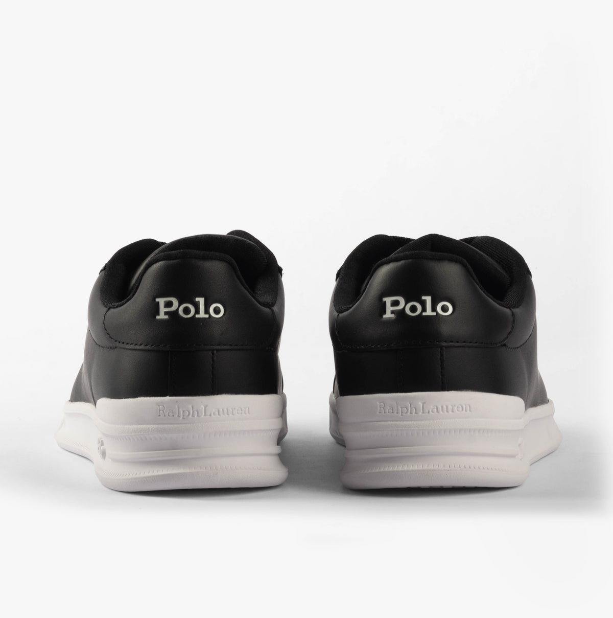 Polo Ralph Lauren HRT CT II Mens Trainers Black/White rear view, showcasing the sleek black leather and white sole design.