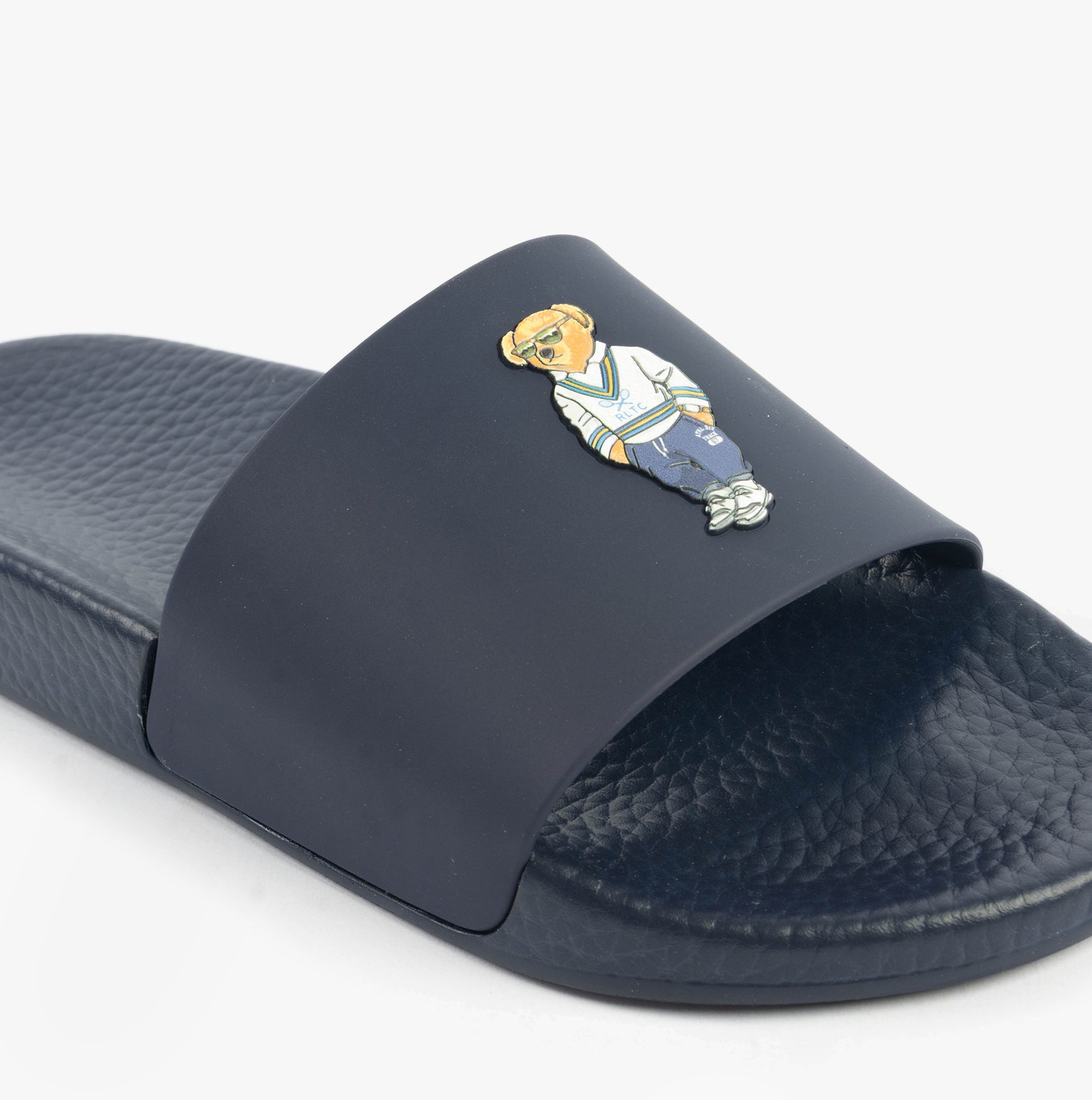 Polo Ralph Lauren POLO SLIDE Mens Sliders Heritage Bear Navy side view with bear logo detail.