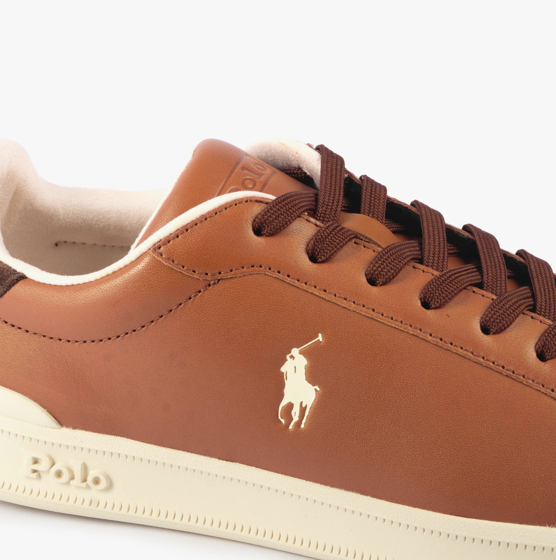 Polo Ralph Lauren HERITAGE COURT II Mens Trainers Tan/Ecru close-up view highlighting leather upper and logo.