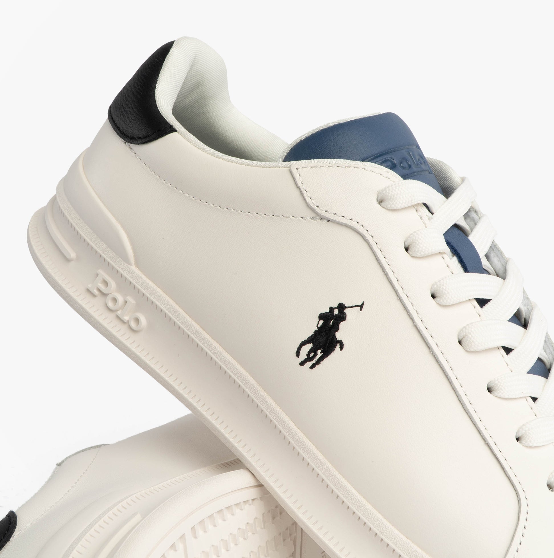 Polo Ralph Lauren Mens Heritage Court II Leather Trainer Off White/Blue side view showcasing leather upper and lace-up design.