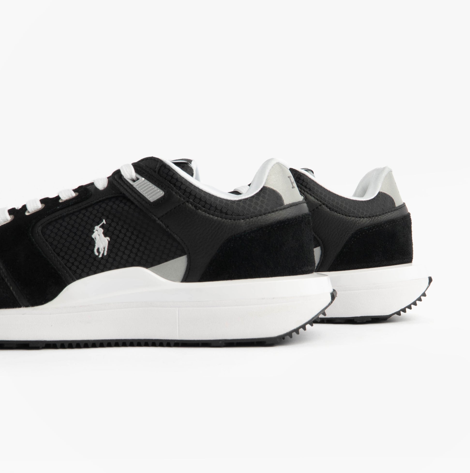 Polo Ralph Lauren Train 89 V2 Mens Suede Panelled Trainer Black/White side view showcasing rear detailing and logo.