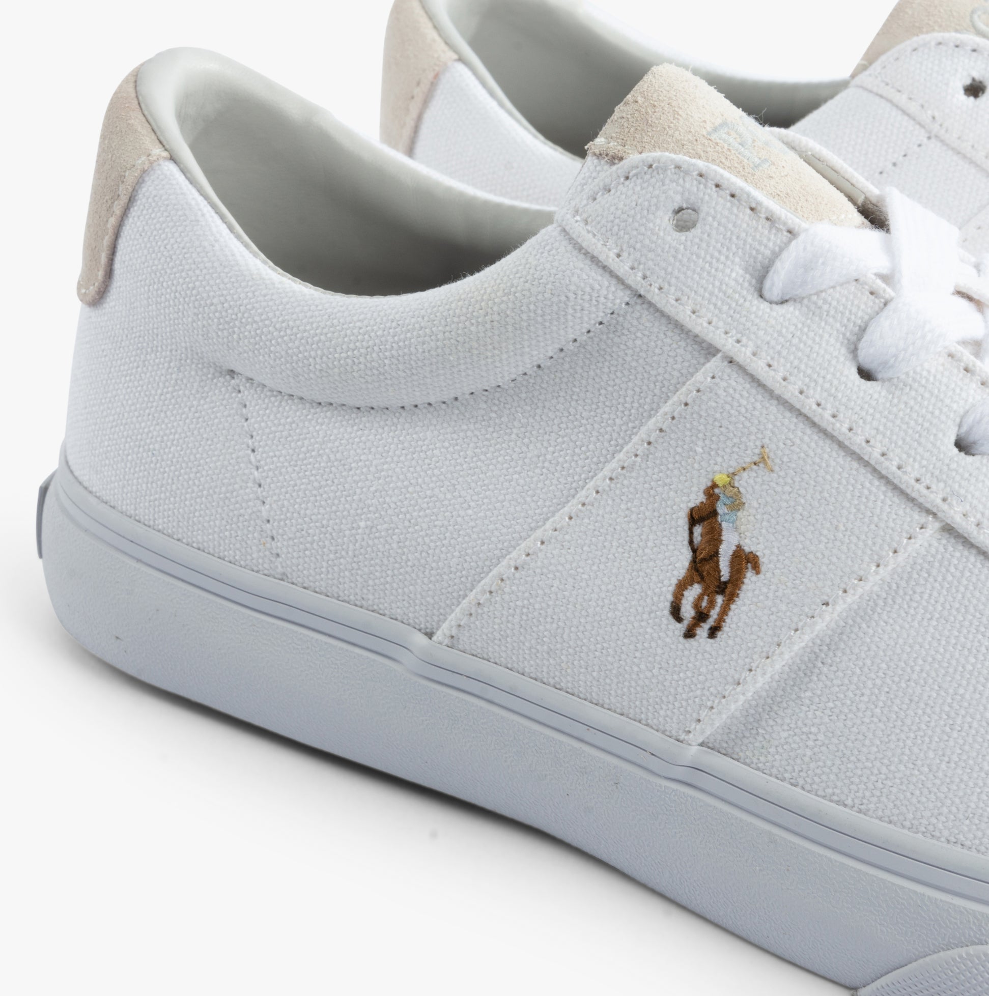 Polo Ralph Lauren SAYER Mens Trainers White close-up detail view showcasing the canvas upper and embroidered logo.