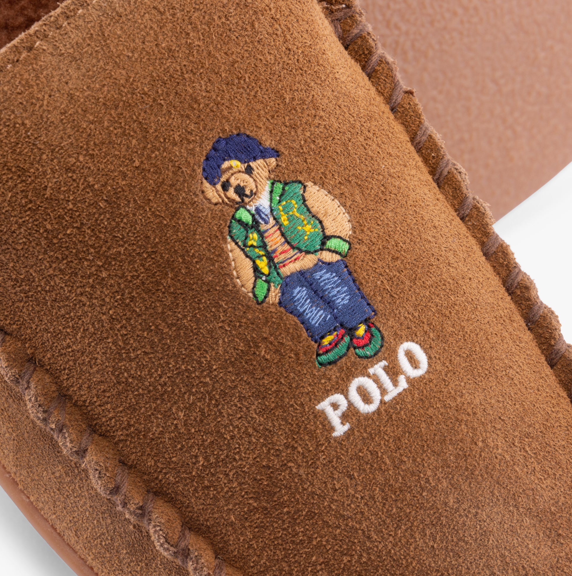 Polo Ralph Lauren BRENAN BEAR Mens Moccasin Slippers Brown detail view of embroidered bear design on suede upper
