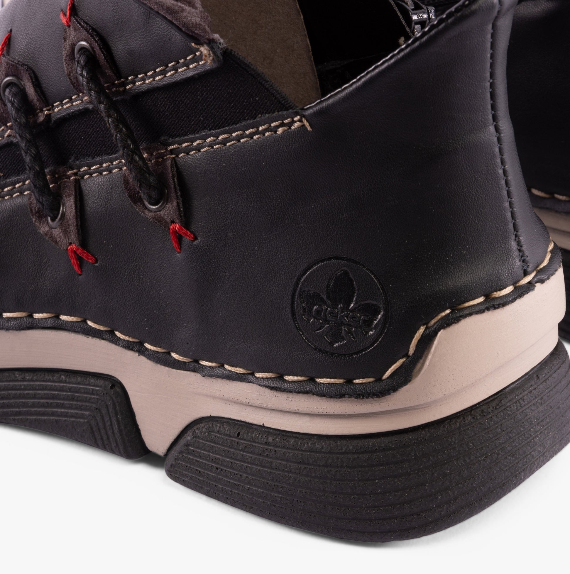 Rieker 45983-00 Womens Boots Black detail view showcasing stitching and logo