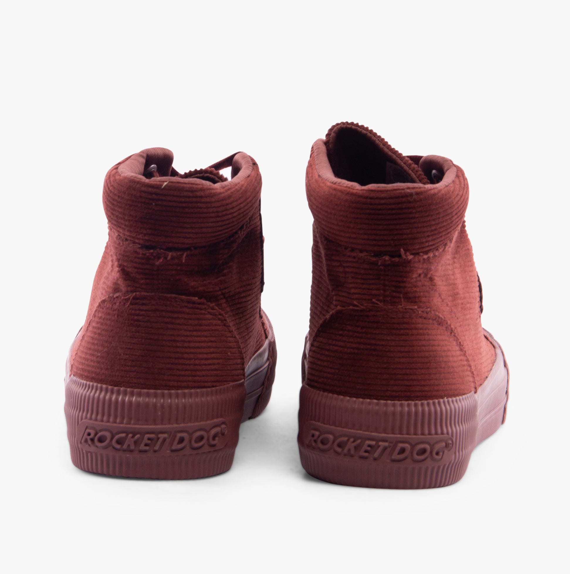 Back view of Rocket Dog CHEERY HI Womens Trainers Rust with a flat rubber sole and low top design.
