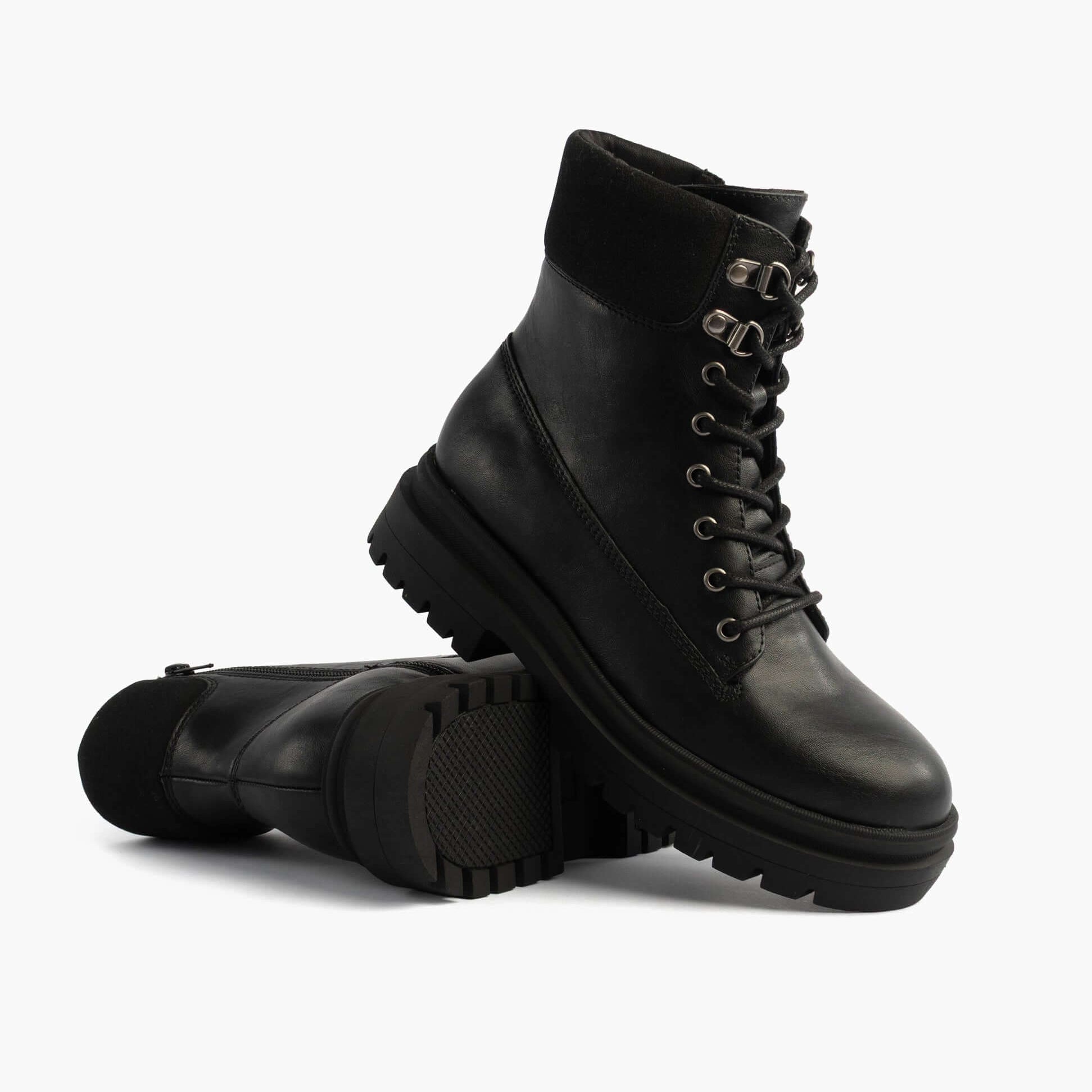 Rocket Dog DANIE Womens Lace Up Boots Black side view showcasing faux leather upper, lace-up and zip detail.