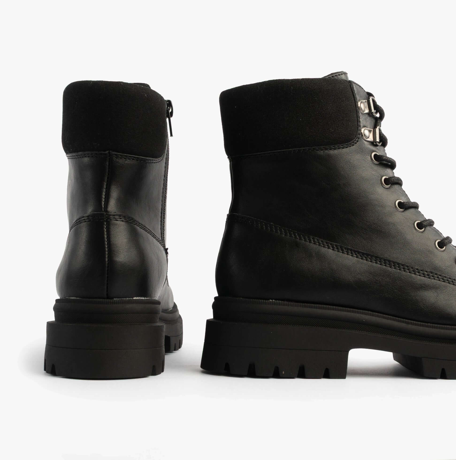 Rocket Dog DANIE Womens Lace Up Boots Black rear and side view showcasing faux leather finish and ankle height design.