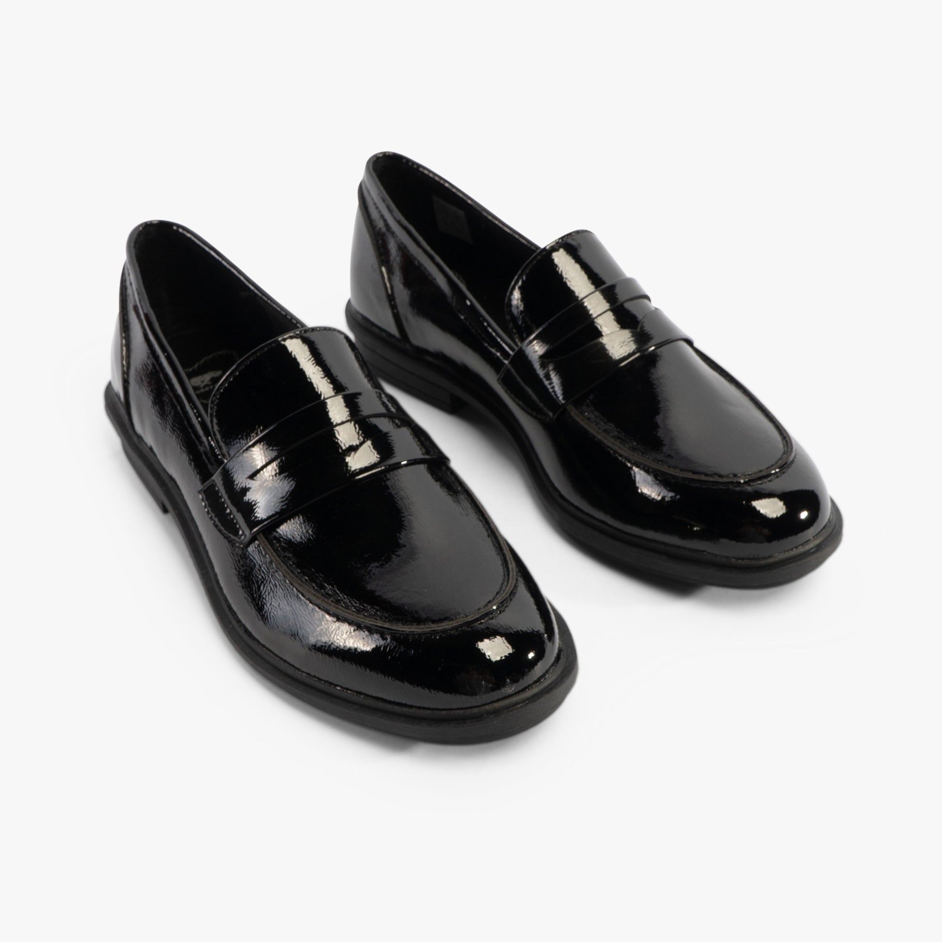Rocket Dog GABBY Womens Shoes Black, side view of shiny black leather loafers with flat sole and round toe.