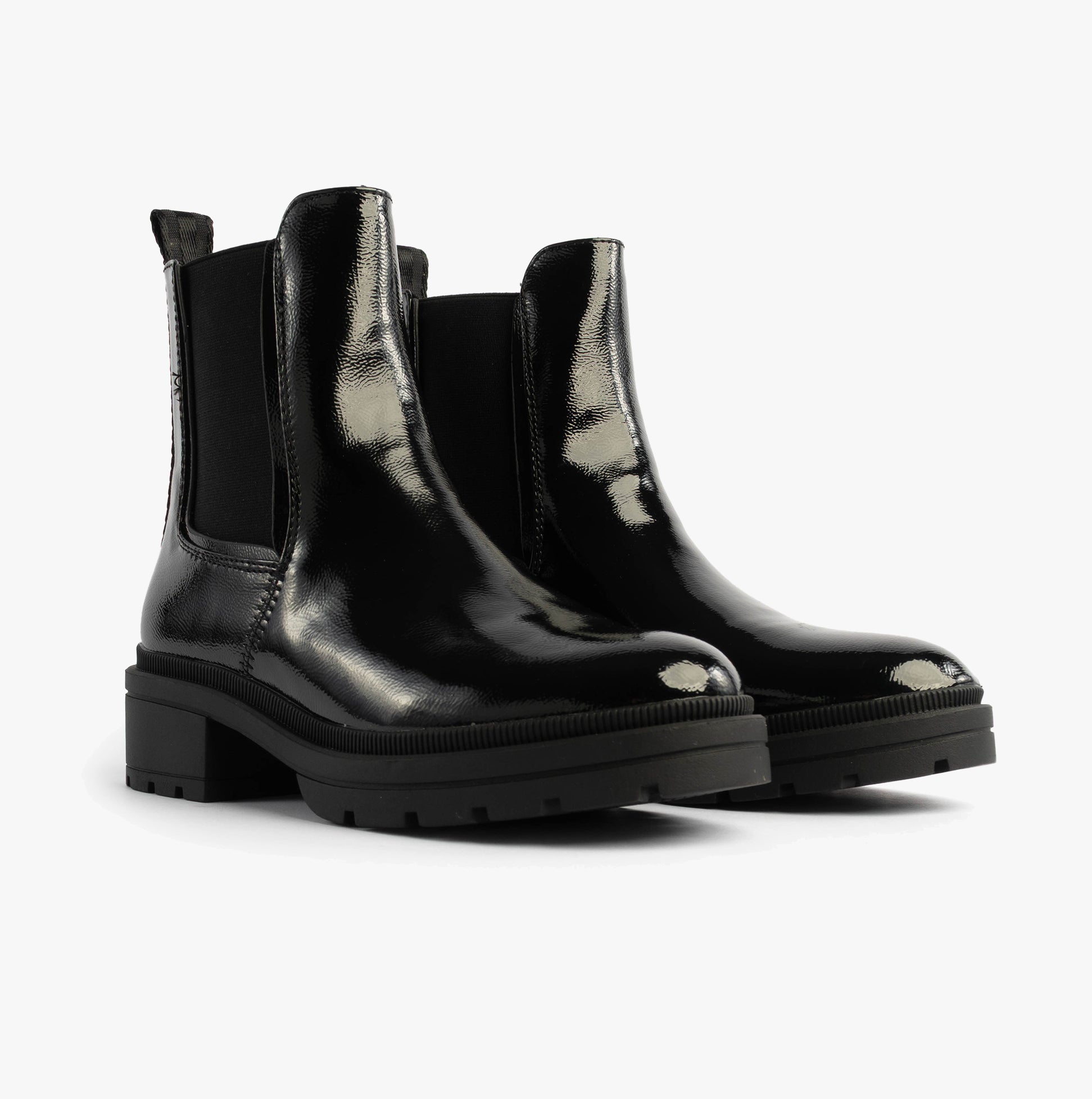 Rocket Dog IGGIE Womens Chelsea Boots Black Patent side view showcasing glossy faux leather upper and sturdy rubber sole.