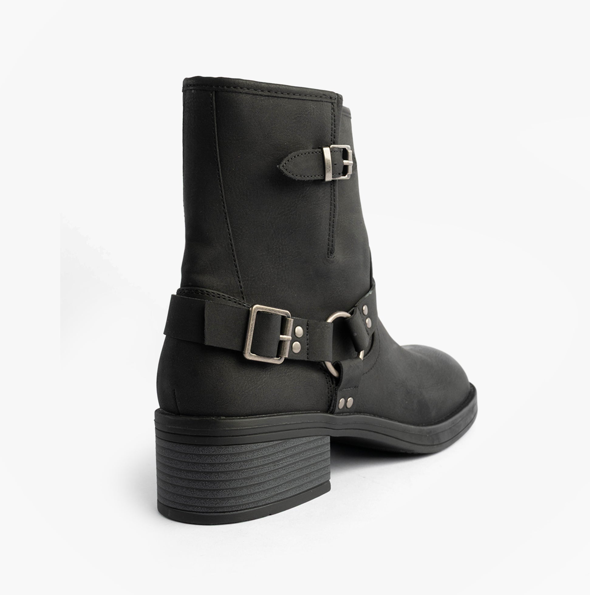 Rocket Dog NINO Womens Boots Black side view showing ankle height, buckle details, and faux leather material.