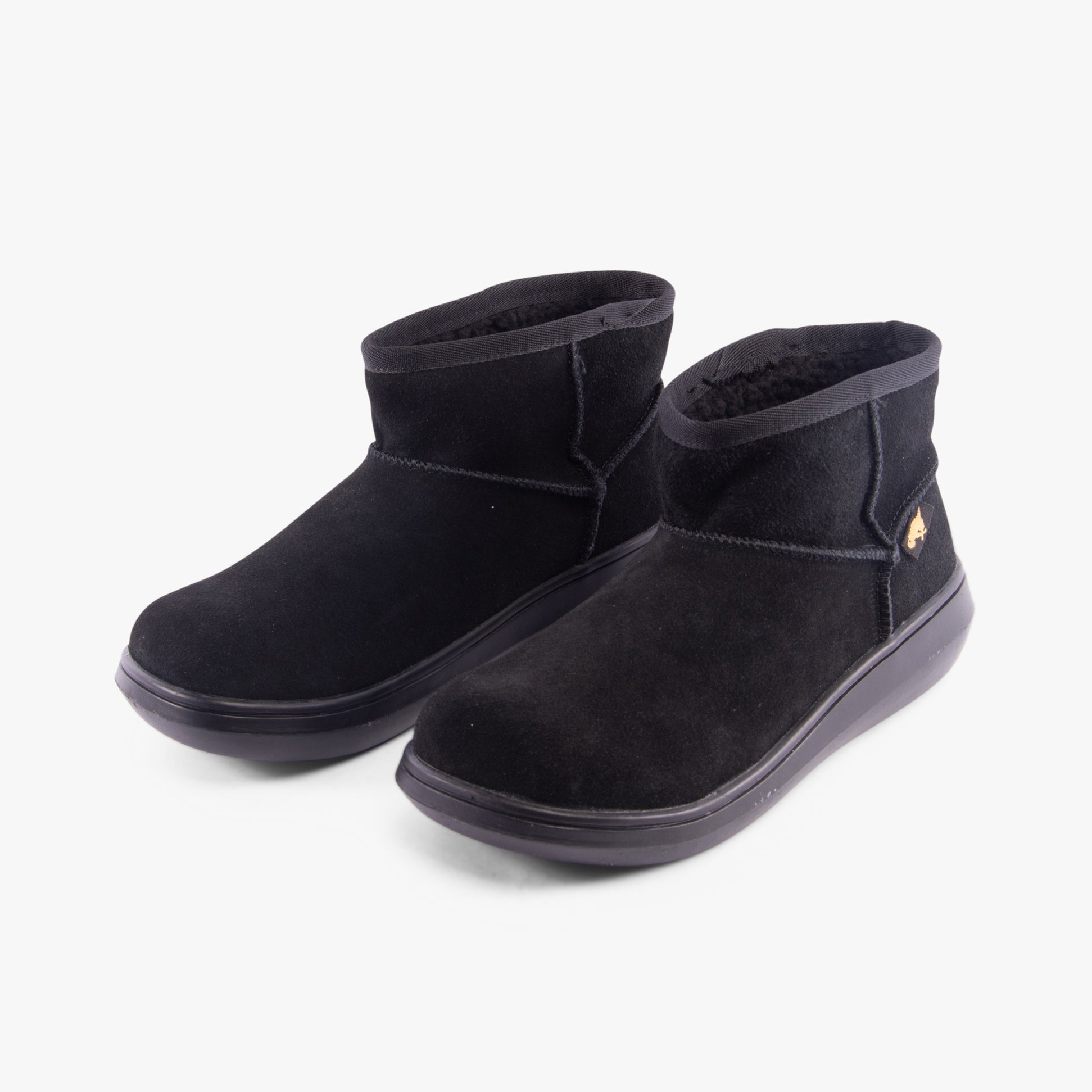 Rocket Dog SUGAR RUSH Womens Mini Boots Black side view showcasing shearling and suede materials.
