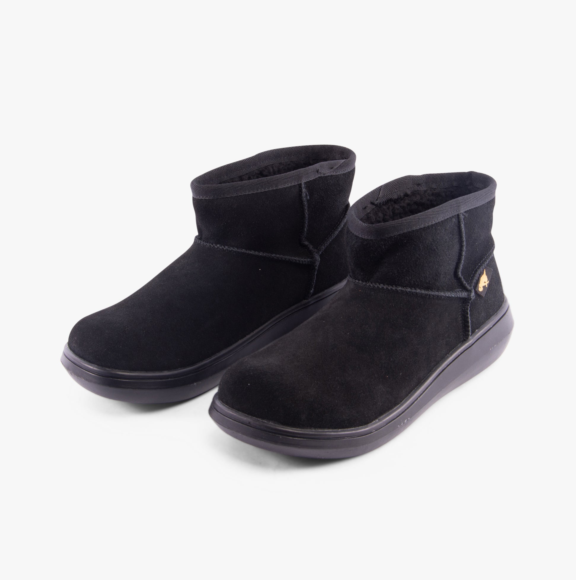 Rocket Dog SUGAR RUSH Womens Mini Boots Black side view showcasing shearling and suede materials.