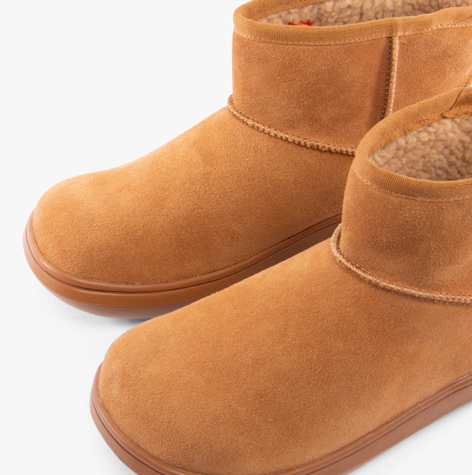 Rocket Dog SUGAR RUSH Womens Mini Boots Camel close-up view showing warm lined suede upper and flat rubber sole.