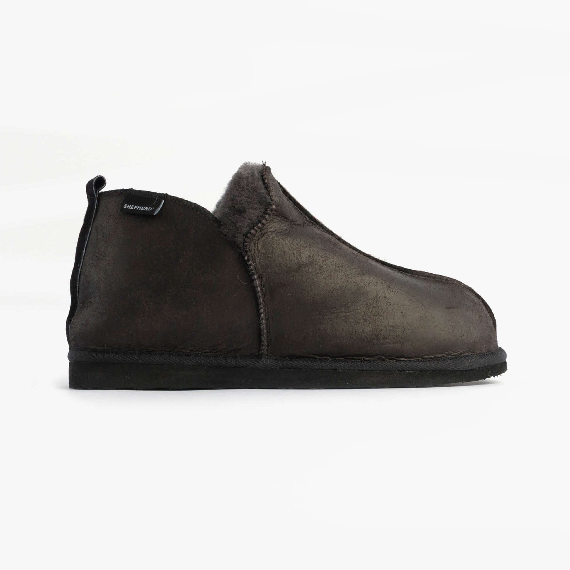 Shepherd ANNIE Womens Slippers Matt Black side view of leather slipper boots with sheepskin lining.
