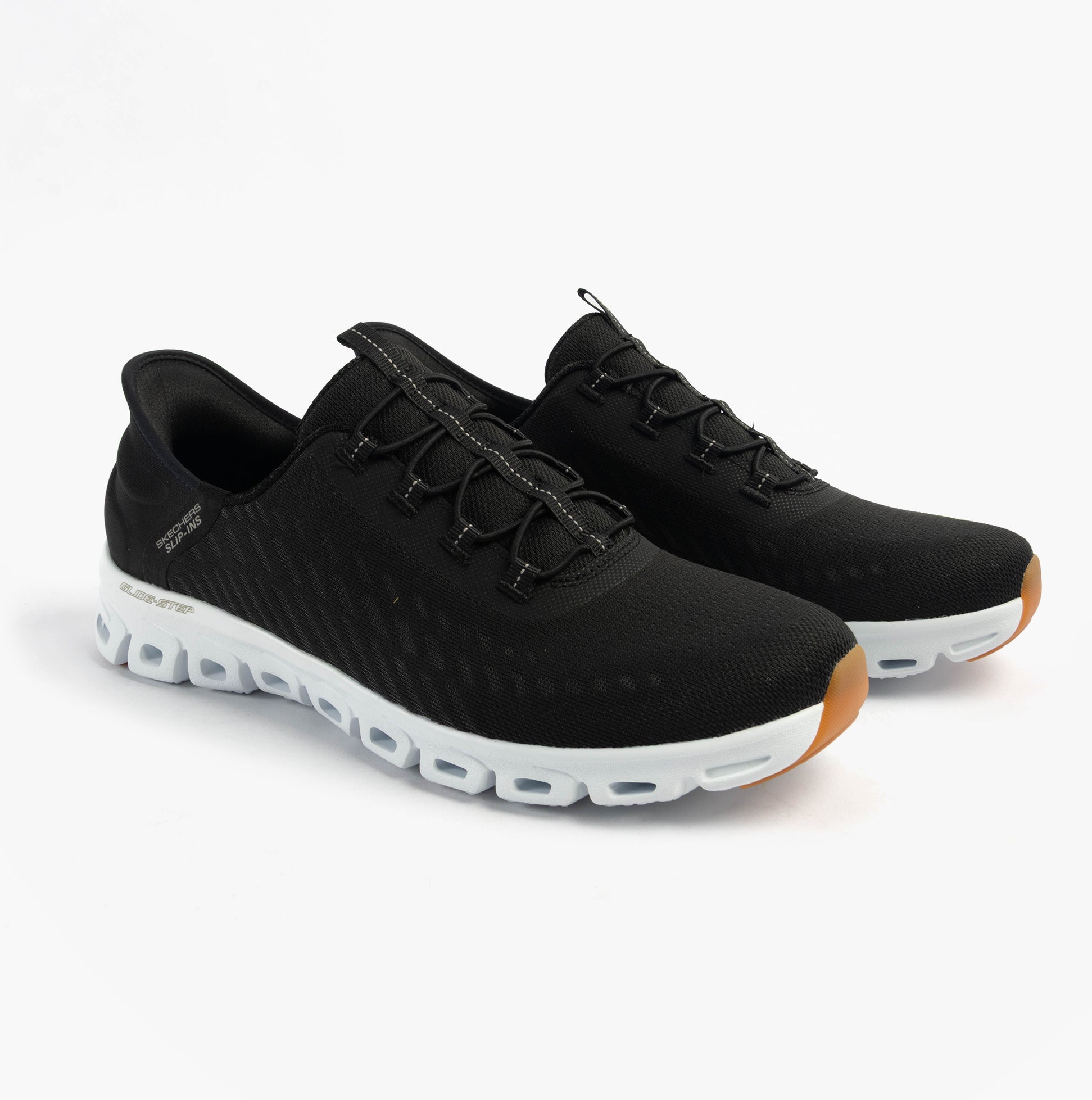 Skechers 104574/BKW GLIDE-STEP - TRANQUILITY Womens Trainers Black/White side view with lace-up closure and rubber sole.