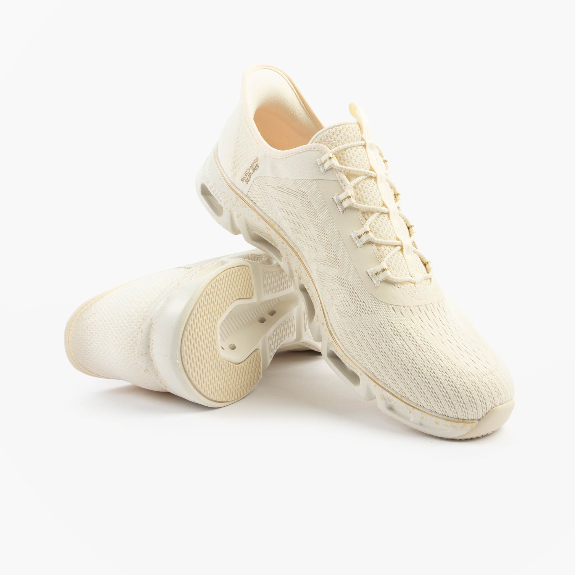 Skechers 104610/NTGD GLIDE-STEP GRATIFY - PACE Womens Trainers Natural/Gold side view, featuring lace-up closure and breathable mesh upper.