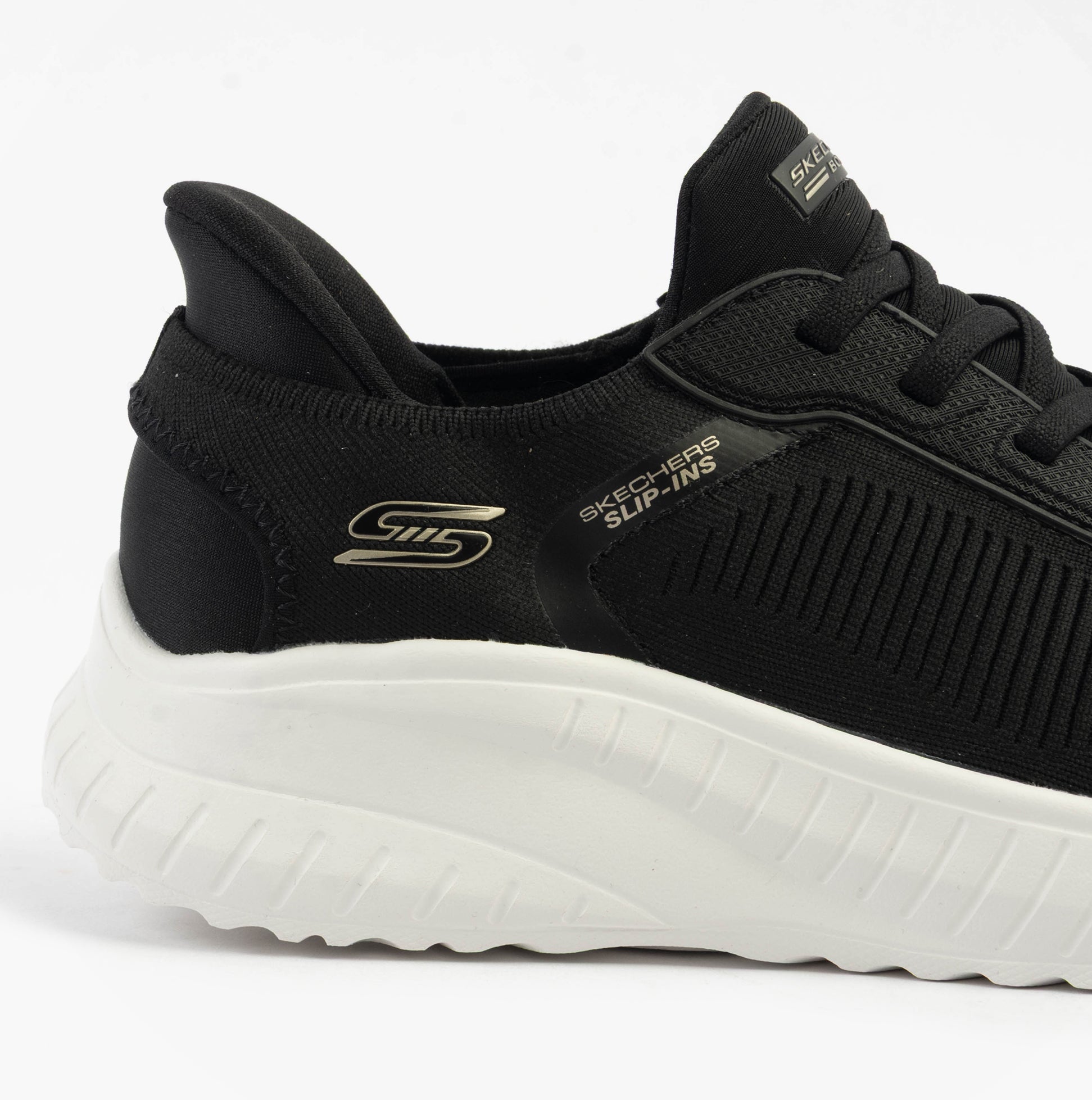 Skechers 117497/BLK BOBS SPORT SQUAD Womens Trainers Black side view with textile upper and rubber sole.