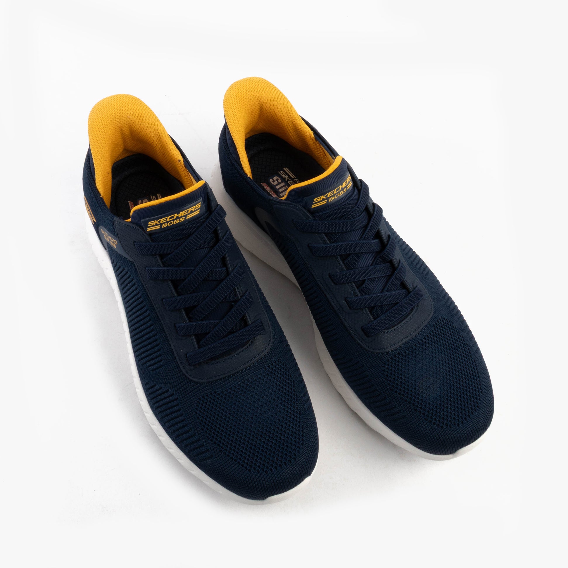 Skechers 118312/NVY BOB SQUAD CHAOS - SOLID STEP Mens Trainers Navy top view with yellow accents and lace-up design.