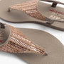 Skechers 119774/TPE MEDITATION - GLAMOROUS MUSE Womens Sandals Taupe top view with decorative strap and comfortable sole.