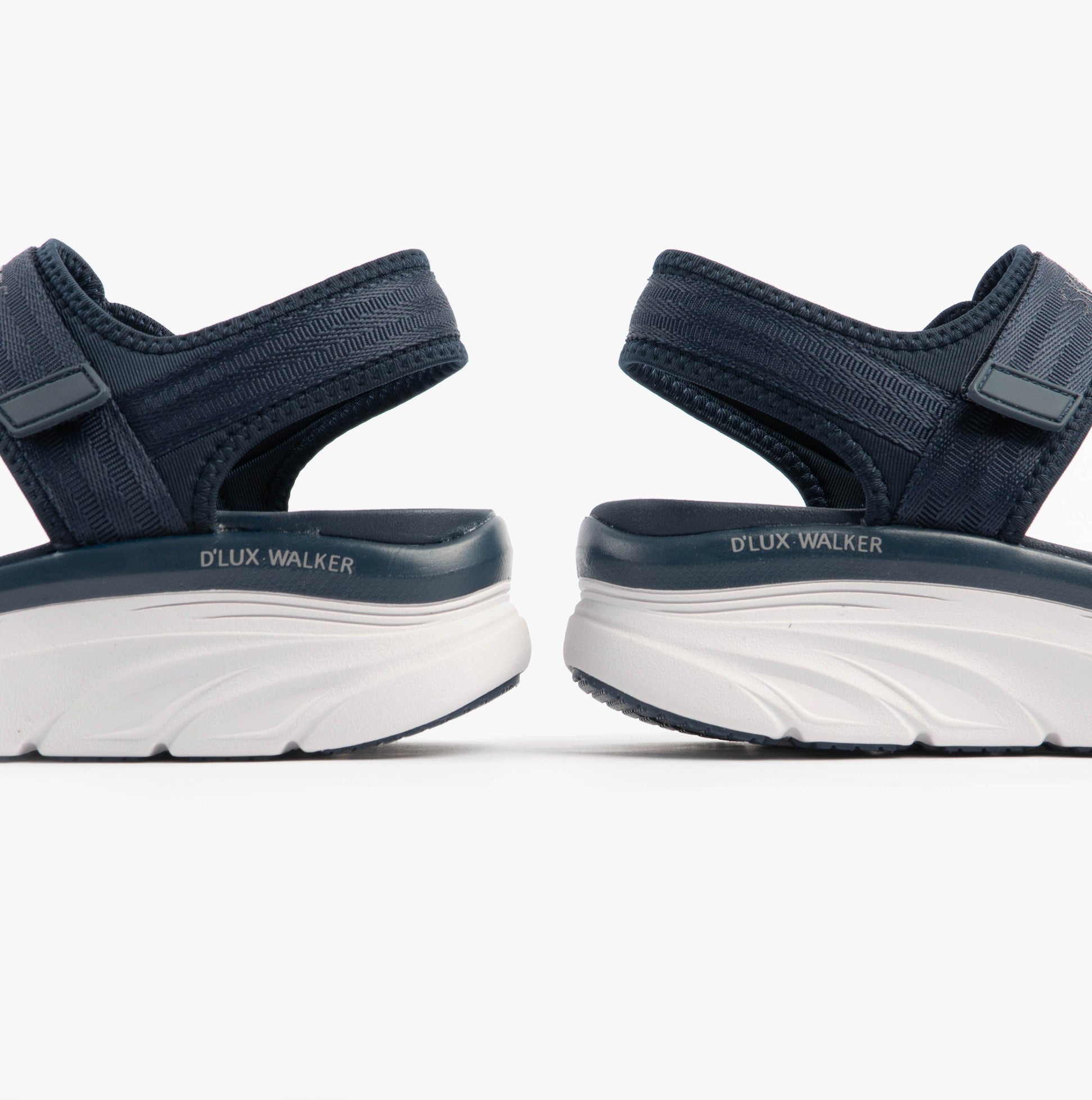 Skechers 119823/NVY D'LUX WALKER - ADORED DAYS Womens Sandals Navy side view showcasing comfortable wedge heel design.