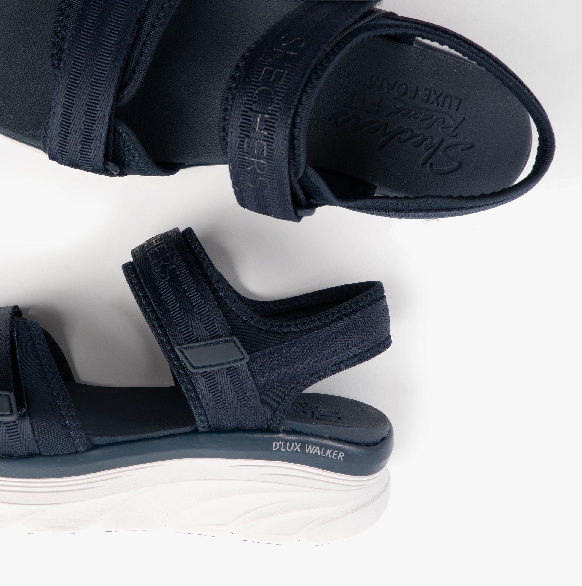 Skechers 119823/NVY D'LUX WALKER - ADORED DAYS Womens Sandals Navy top view showcasing straps and wedge sole.