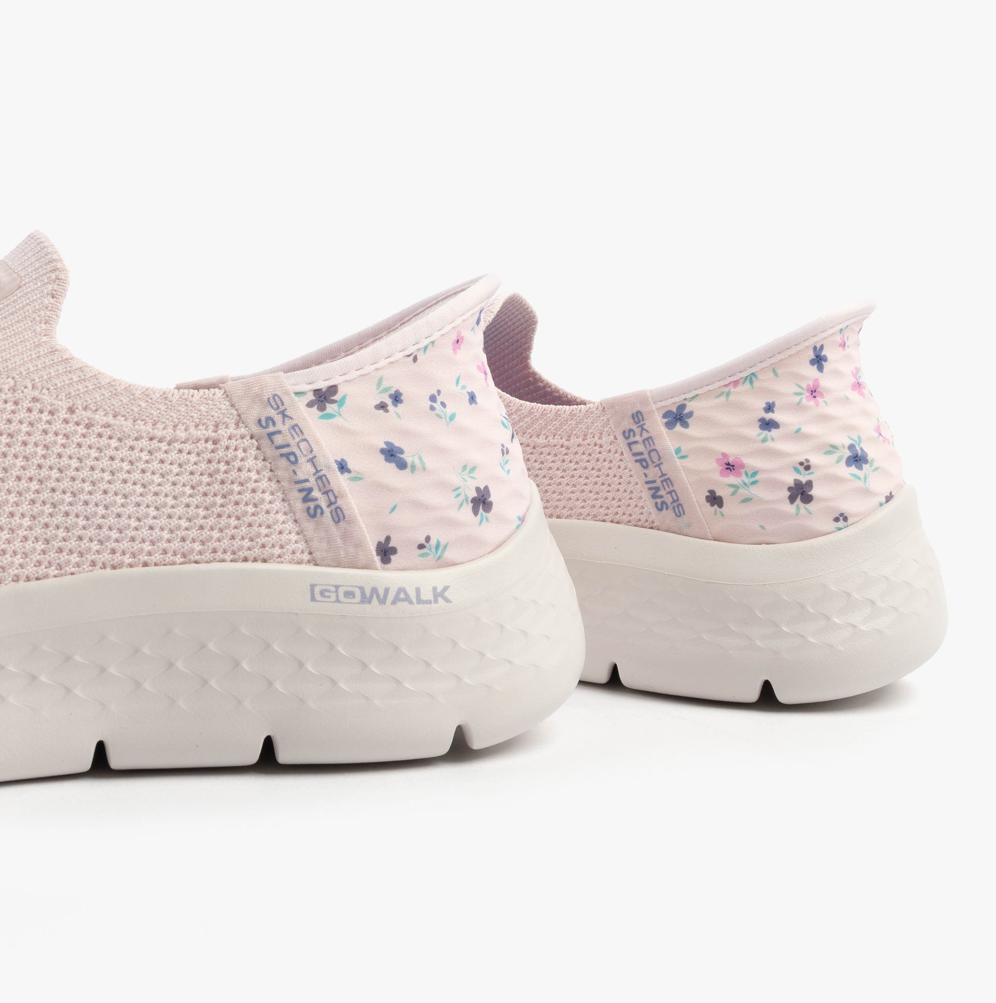 Skechers 124822/LTPK GO WALK FLEX - SUNSET ROSE Womens Trainers Light Pink side view with floral details and mesh upper.