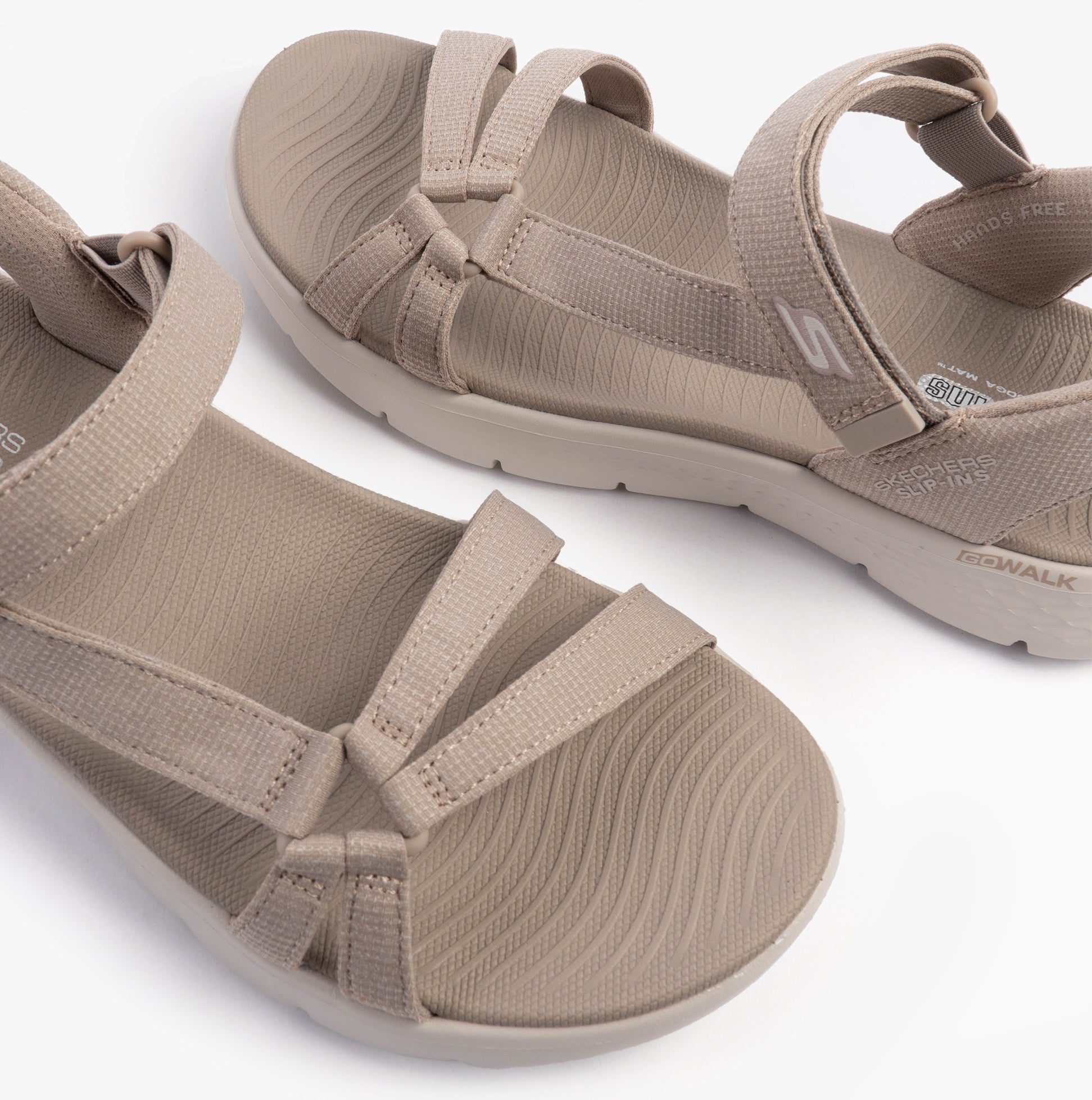 Skechers 141481/TPE GO WALK FLEX SANDAL - ILLUMINATE Womens Sandals Taupe side view showcasing soft mesh straps and rubber sole.