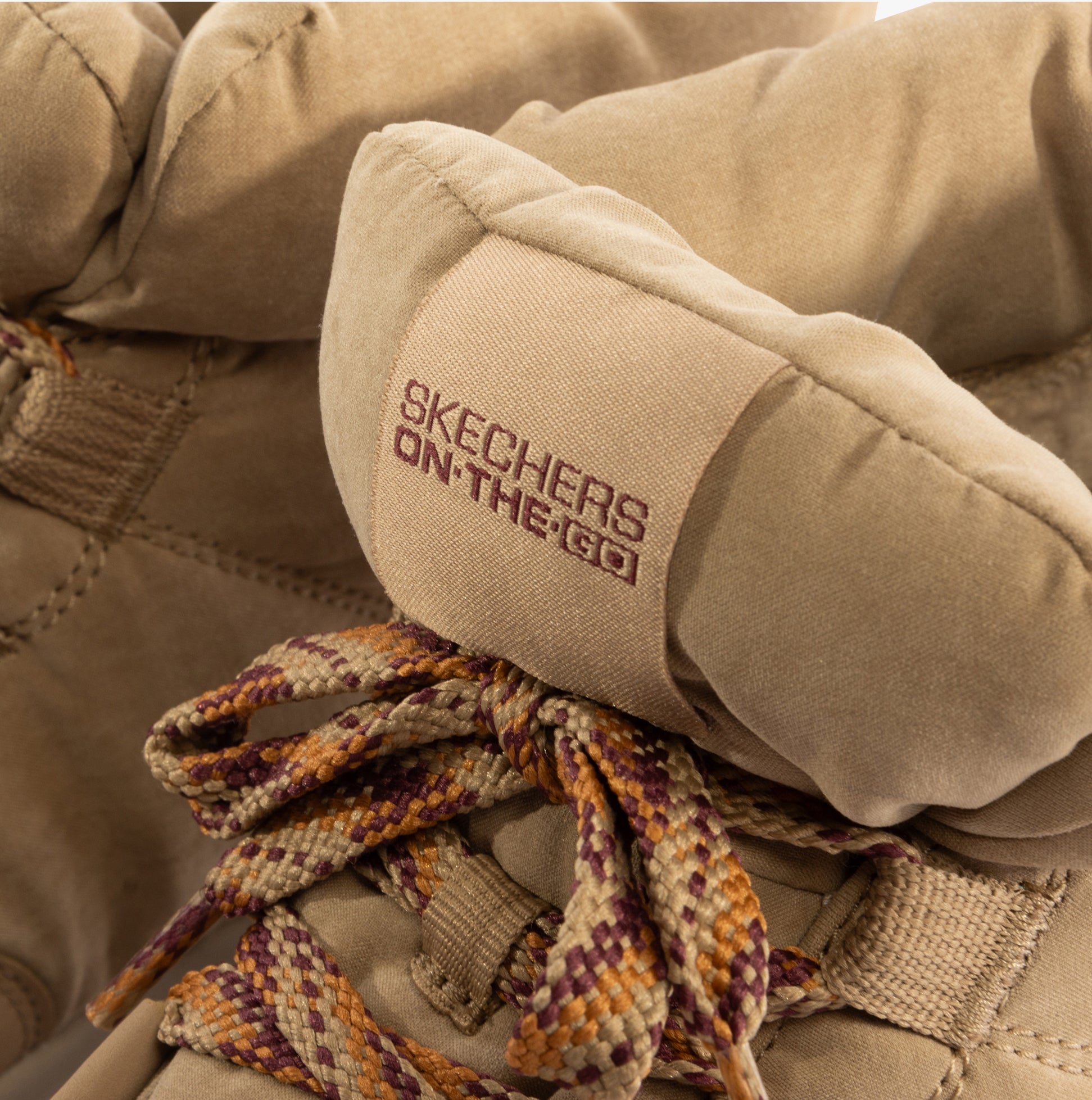 Skechers 144194/TAN GLACIAL ULTRA-TREND UP Womens Boots Tan detail view showing lace-up and branding.