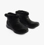 Skechers 144800/BBK ON-THE-GO JOY - COZY DREAM Womens Boots Black side view, featuring faux leather and faux fur lining.