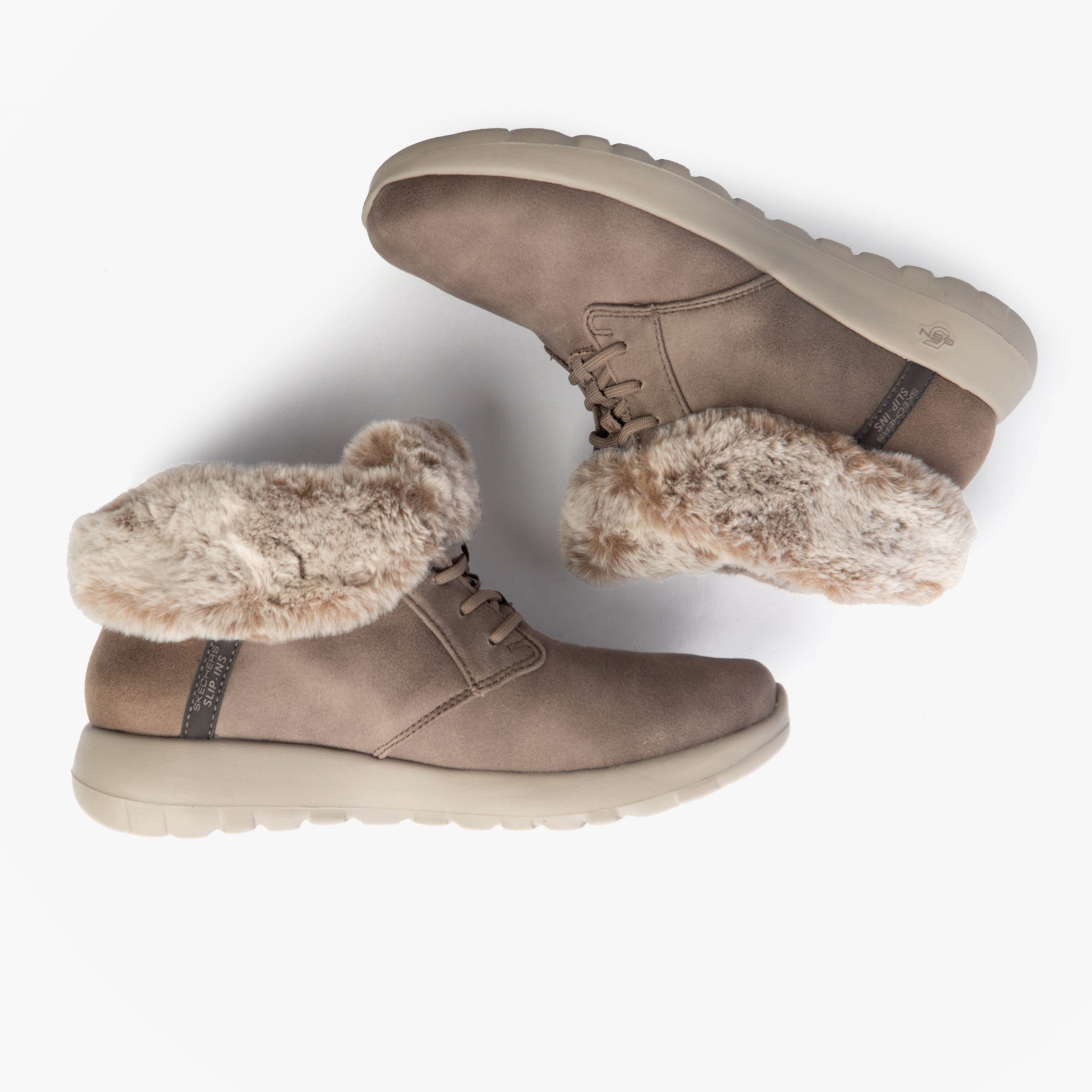 Skechers 144803/DKTP ON-THE-GO JOY - COZY CHARM Womens Boots Dark Taupe side view showing faux fur lining and slip-on design.